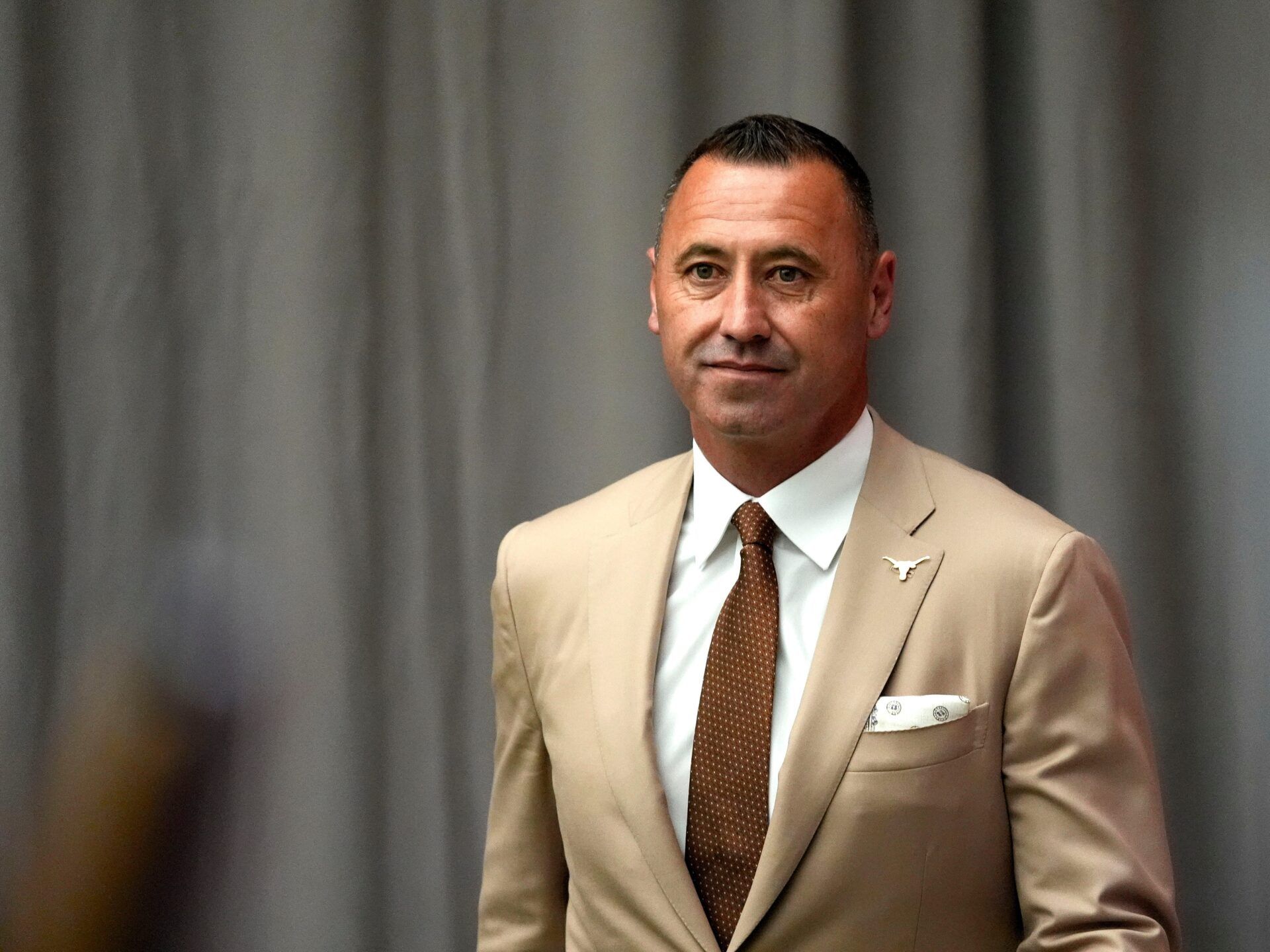 Texas head coach Steve Sarkisian waits off stage as he is introduced during SEC Media Days at the College Football Hall of Fame in Atlanta.