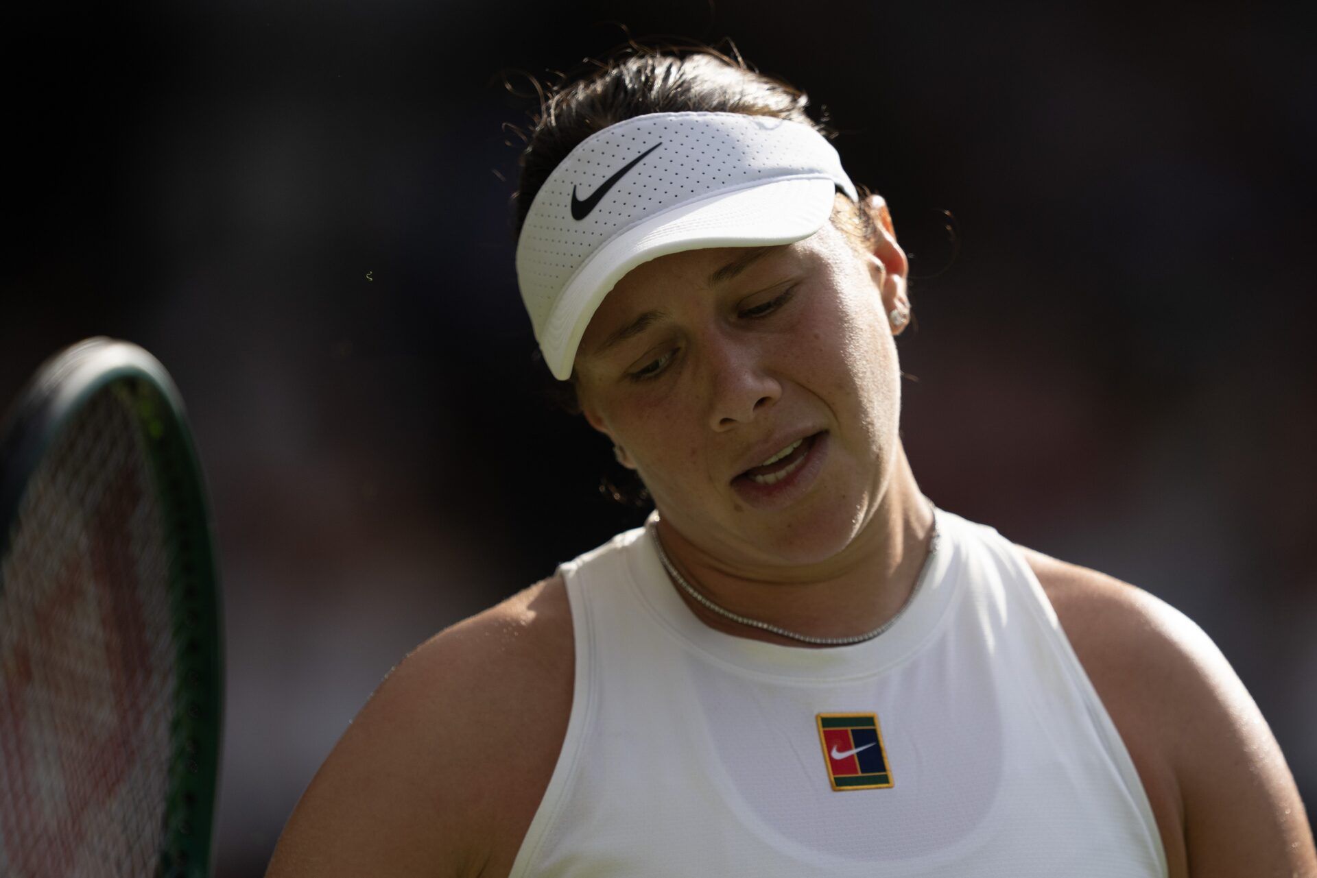 Iga Swiatek of Poland reacts to a point during the women’s final match against Amanda Anisimova of the United States on day 13 at All England Lawn Tennis and Croquet Club.