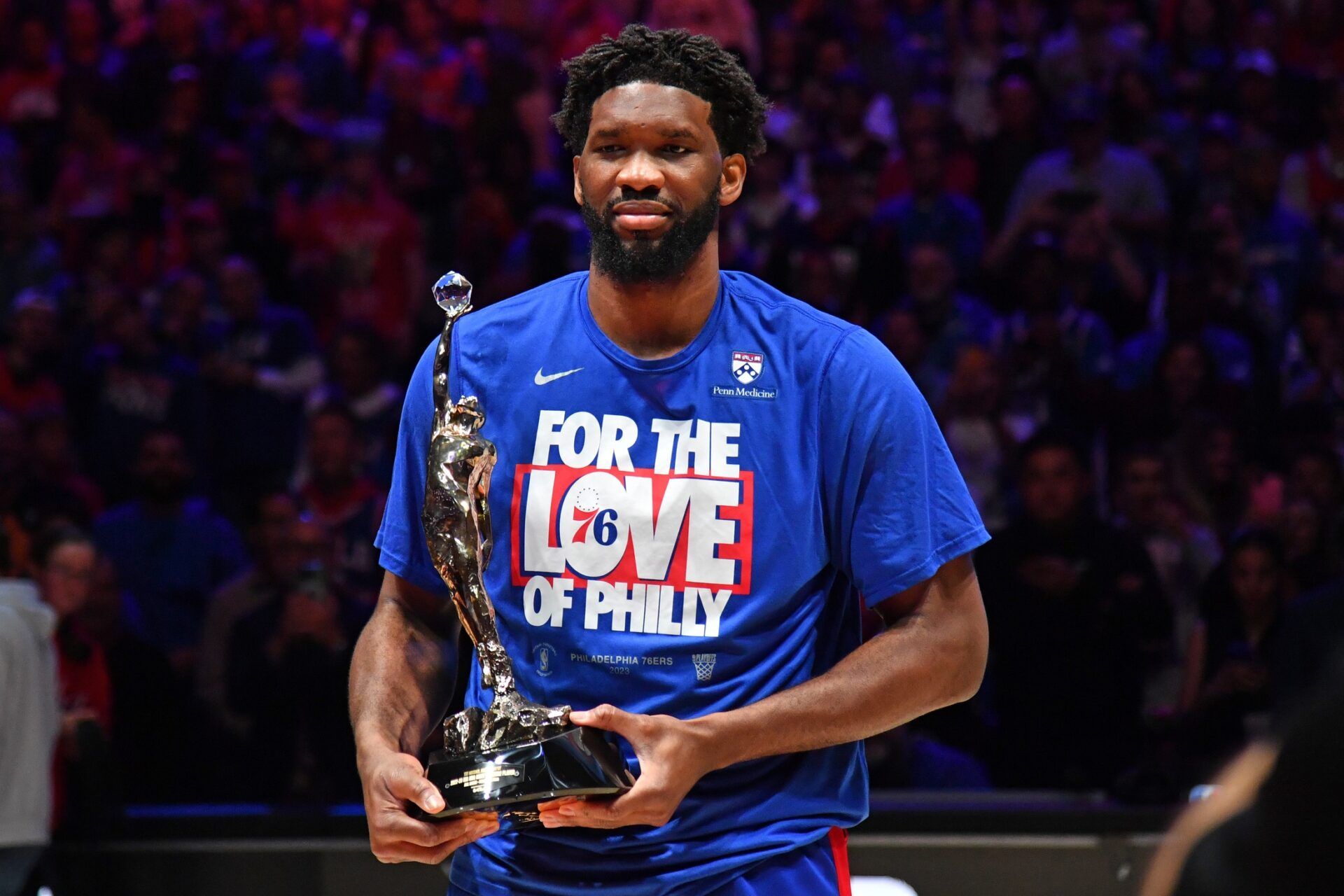 NBA Philadelphia 76ers center Joel Embiid (21) poses with the MVP trophy before game three of the 2023 NBA playoffs against the Boston Celtics at Wells Fargo Center.