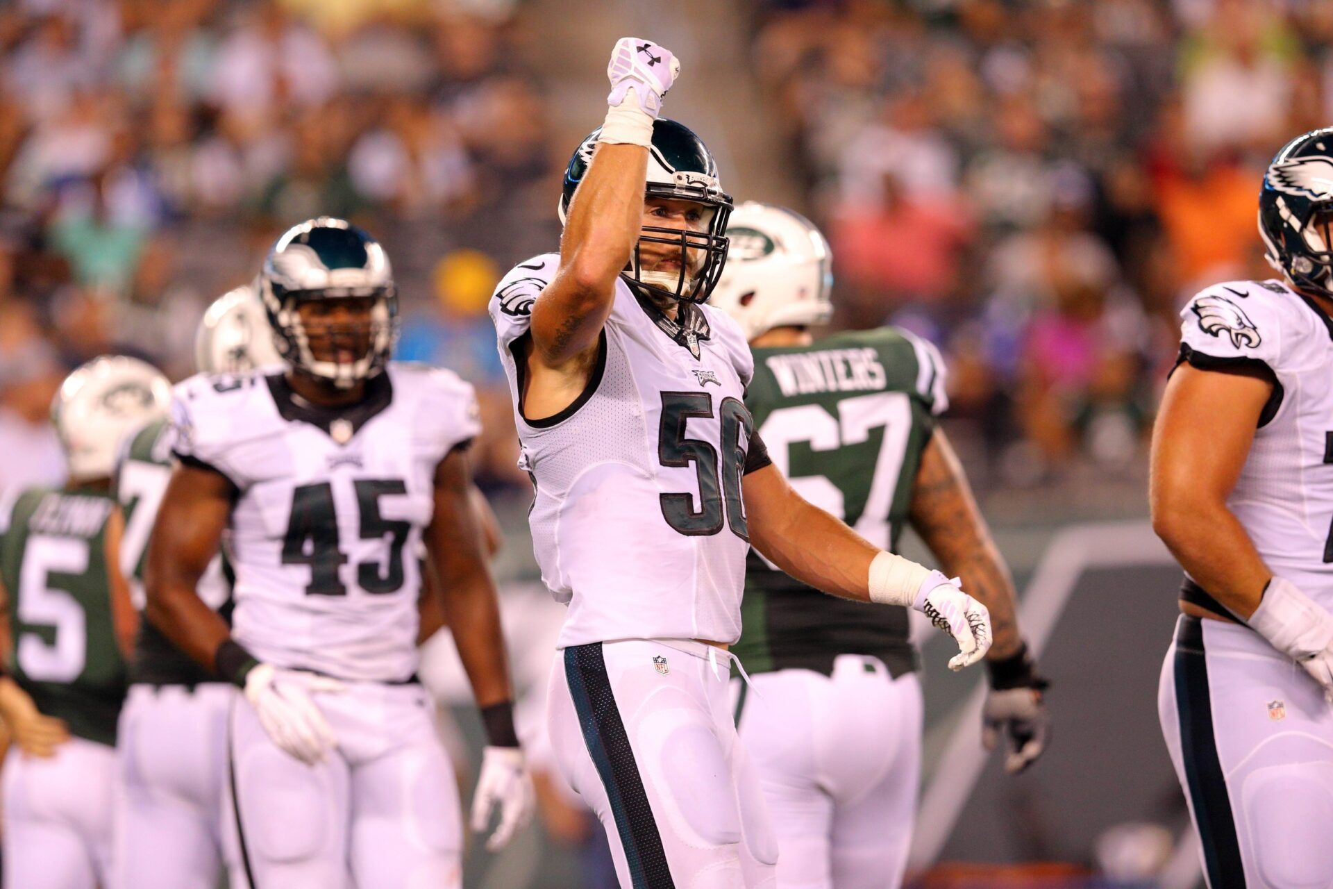 Philadelphia Eagles linebacker Bryan Braman (56) reacts after sacking New York Jets quarterback Matt Flynn (not pictured) during the second quarter of a preseason game at MetLife Stadium.