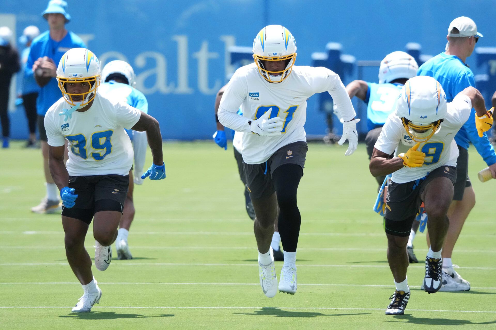 Los Angeles Chargers receivers Jaylen Johnson (39), Mike Williams (81) and receiver Tre Harris (9) during organized team activities at The Bolt.