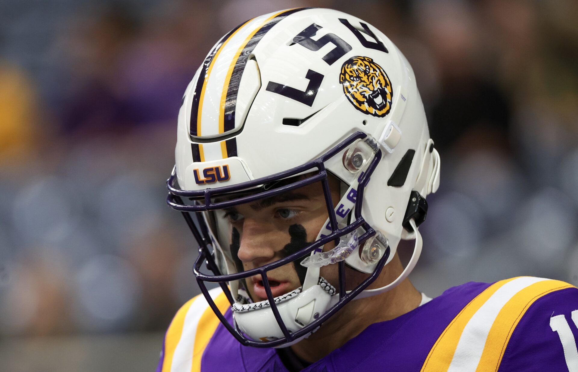 LSU Tigers quarterback Garrett Nussmeier (13) warms up before playing against the Baylor Bears at NRG Stadium.