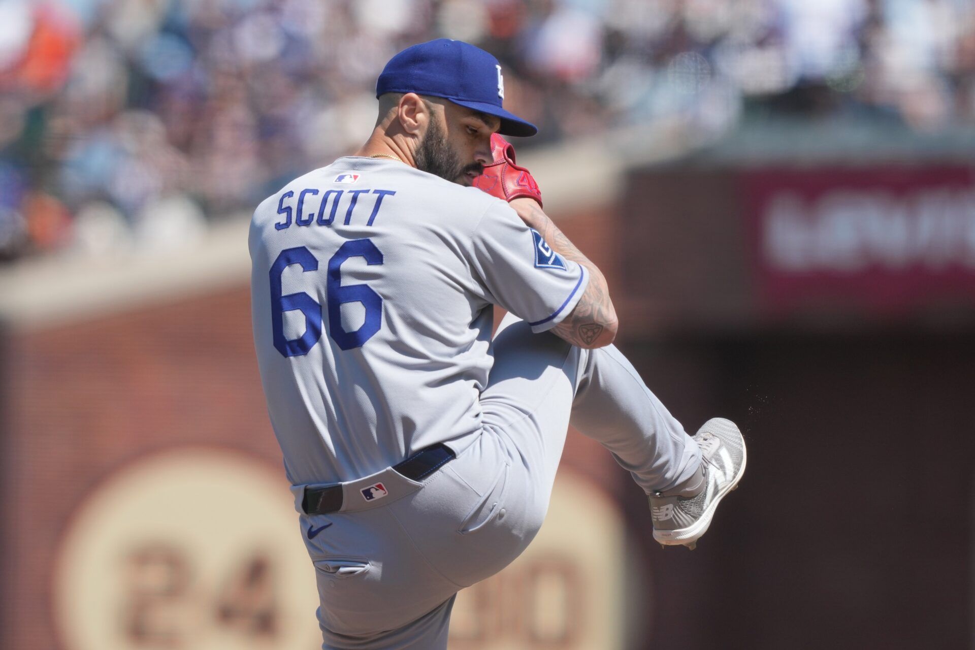 Los Angeles Dodgers pitcher Tanner Scott (66) throws a pitch against the San Francisco Giants during the ninth inning at Oracle Park.