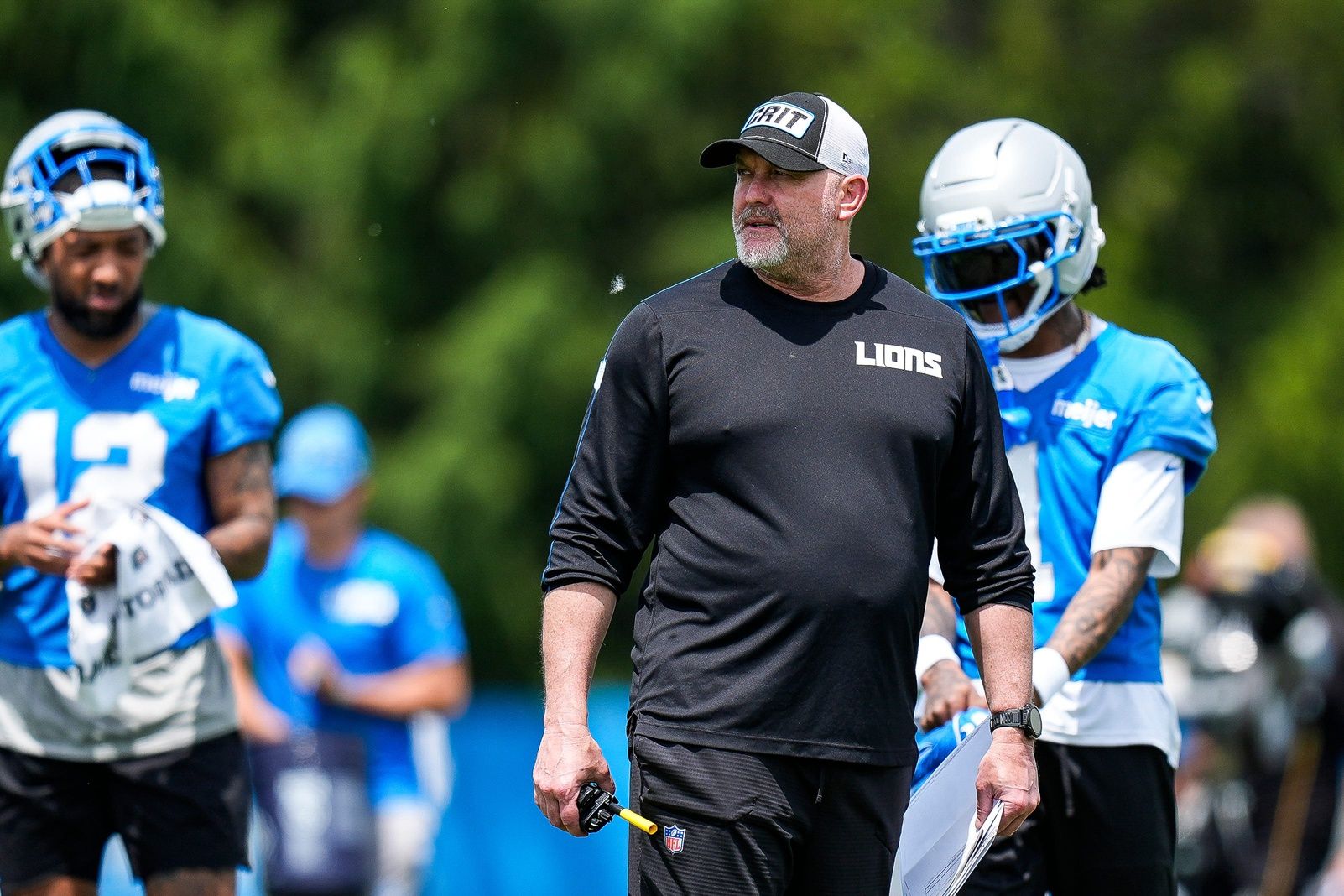 Detroit Lions offensive coordinator John Morton watches practice during OTA at Meijer Performance Center in Allen Park on Friday, May 30, 2025.