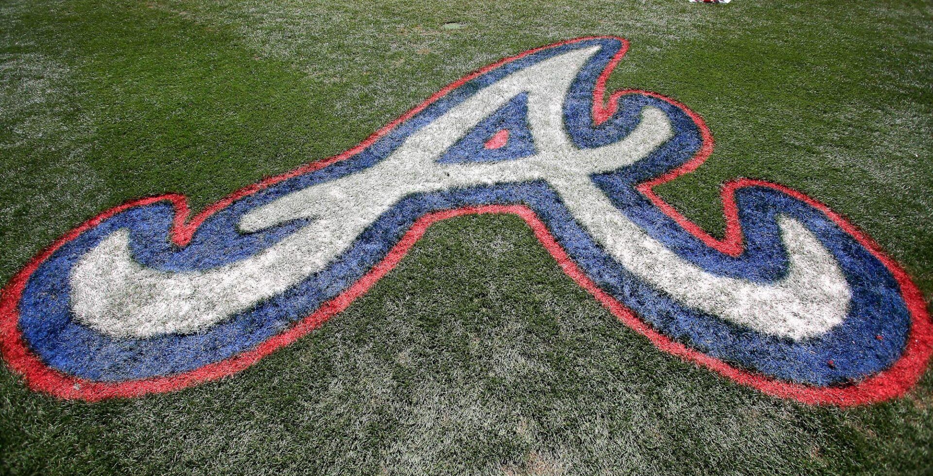 The Atlanta Braves logo painted on the field during a spring training baseball game at Champion Stadium. The Toronto Blue Jays beat the Atlanta Braves 10-5.