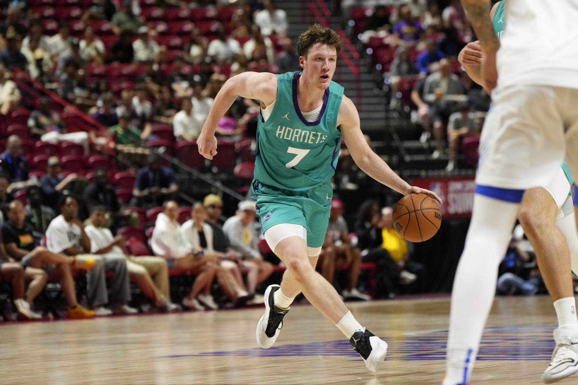 Charlotte Hornets guard Kon Knueppel (7) dribbles the ball against the Dallas Mavericks during the second half of a NBA basketball game at the Thomas & Mack Center.