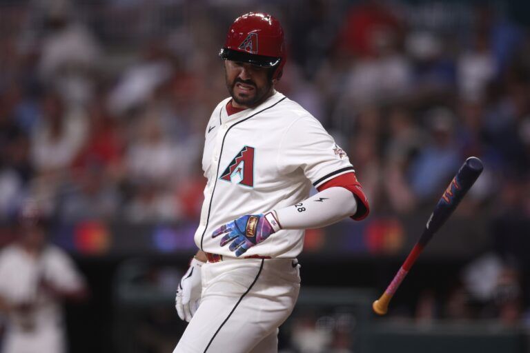 National League third baseman Eugenio Suarez (28) of the Arizona Diamondbacks reacts after getting hit by a pitch in the eighth inning during the 2025 MLB All Star Game at Truist Park.