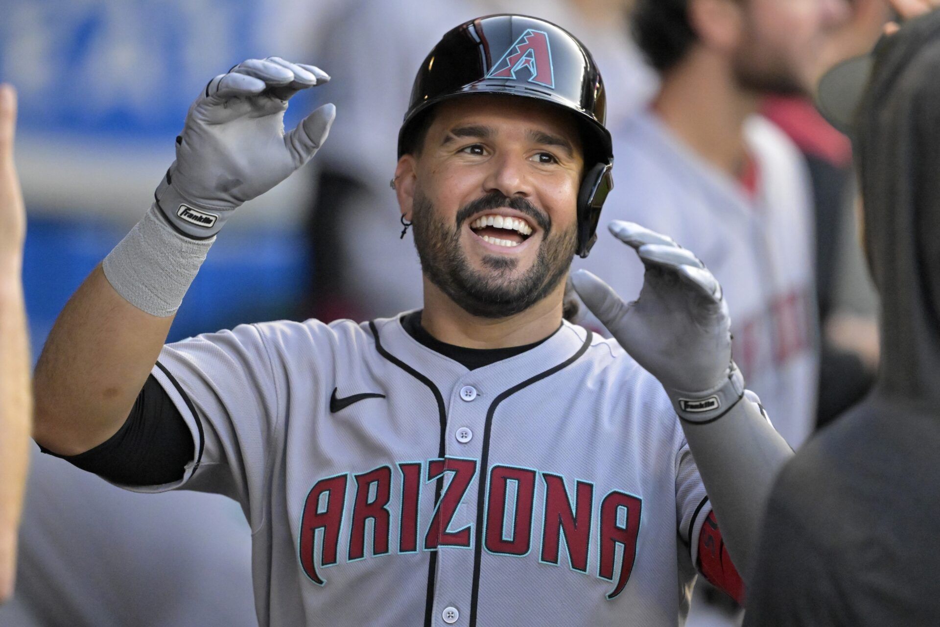 Arizona Diamondbacks third baseman Eugenio Suarez (28) celebrates in the dugout after his second solo home run of the game during the fourth inning against the Los Angeles Angels at Angel Stadium.