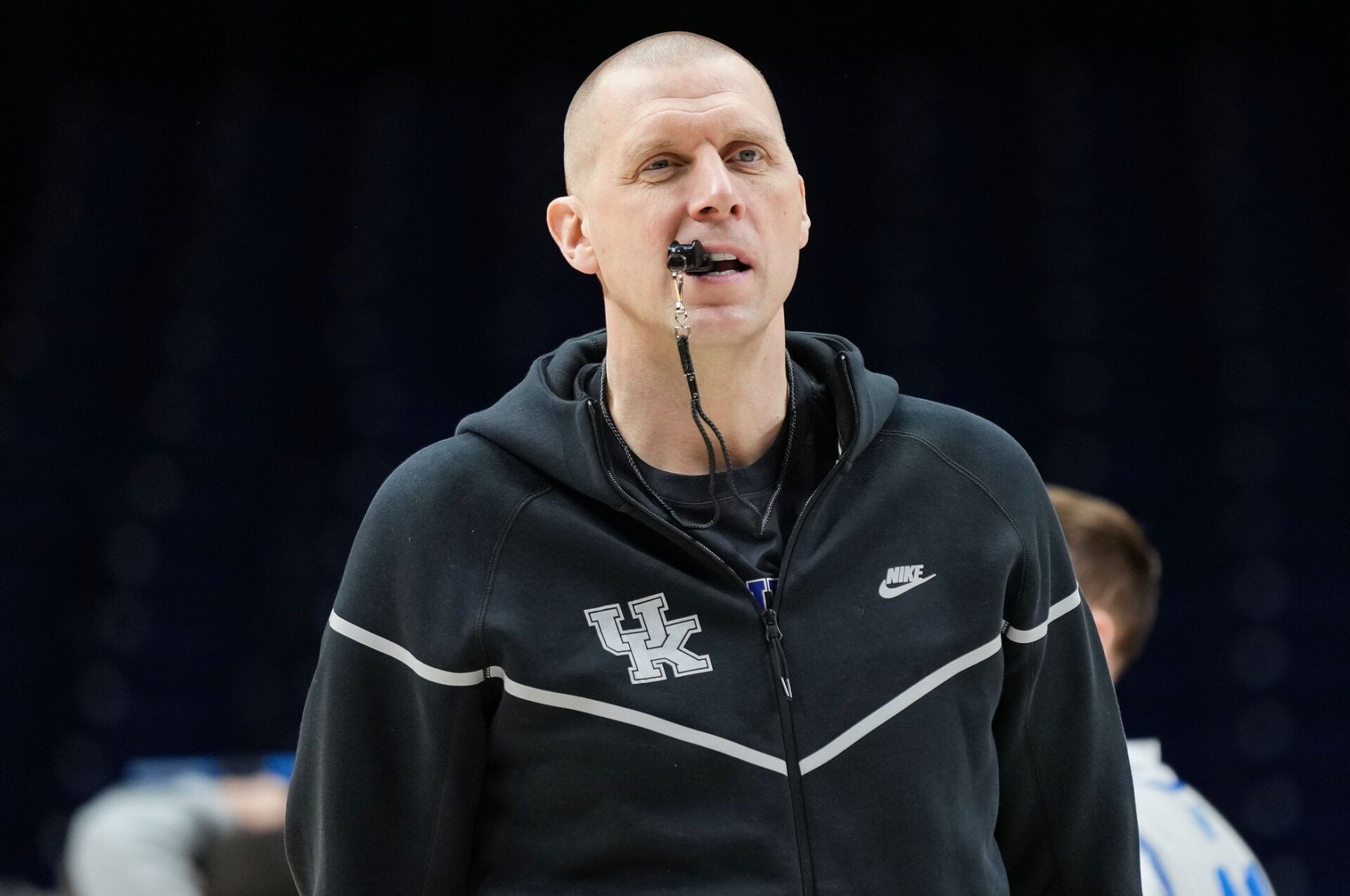 Kentucky Wildcats head coach Mark Pope walks onto the court Thursday, March 27, 2025, during practice ahead of the Sweet 16 March Madness tournament game against the Tennessee Volunteers at Lucas Oil Stadium in Indianapolis.
