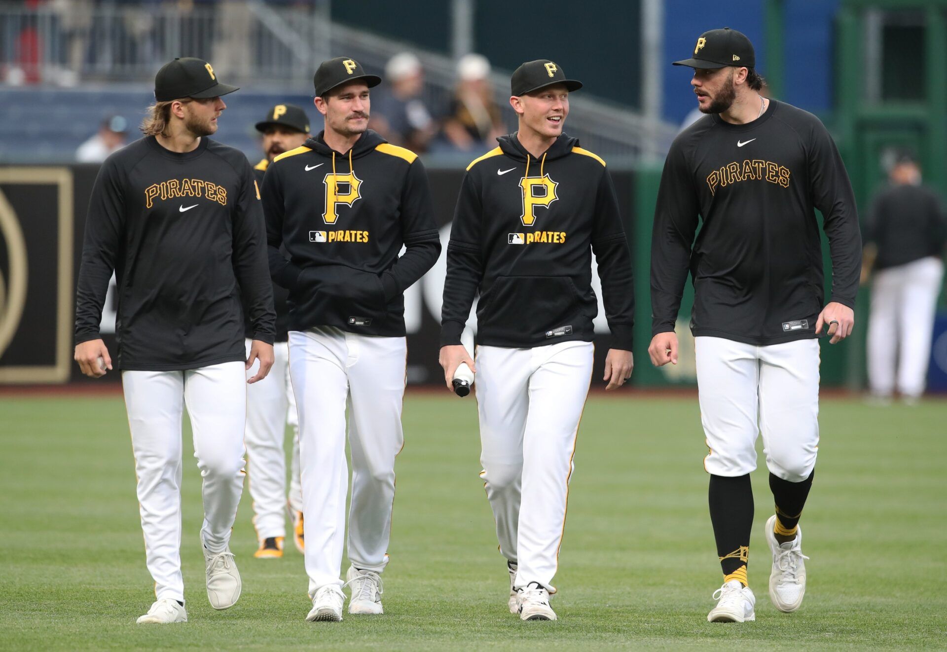Pittsburgh Pirates starting pitchers (L to R) Carmen Mlodzinski (50), Andrew Heaney (45), Mitch Keller (23) and Paul Skenes (30) walk in from the bullpen before the game against the Cincinnati Reds at PNC Park.