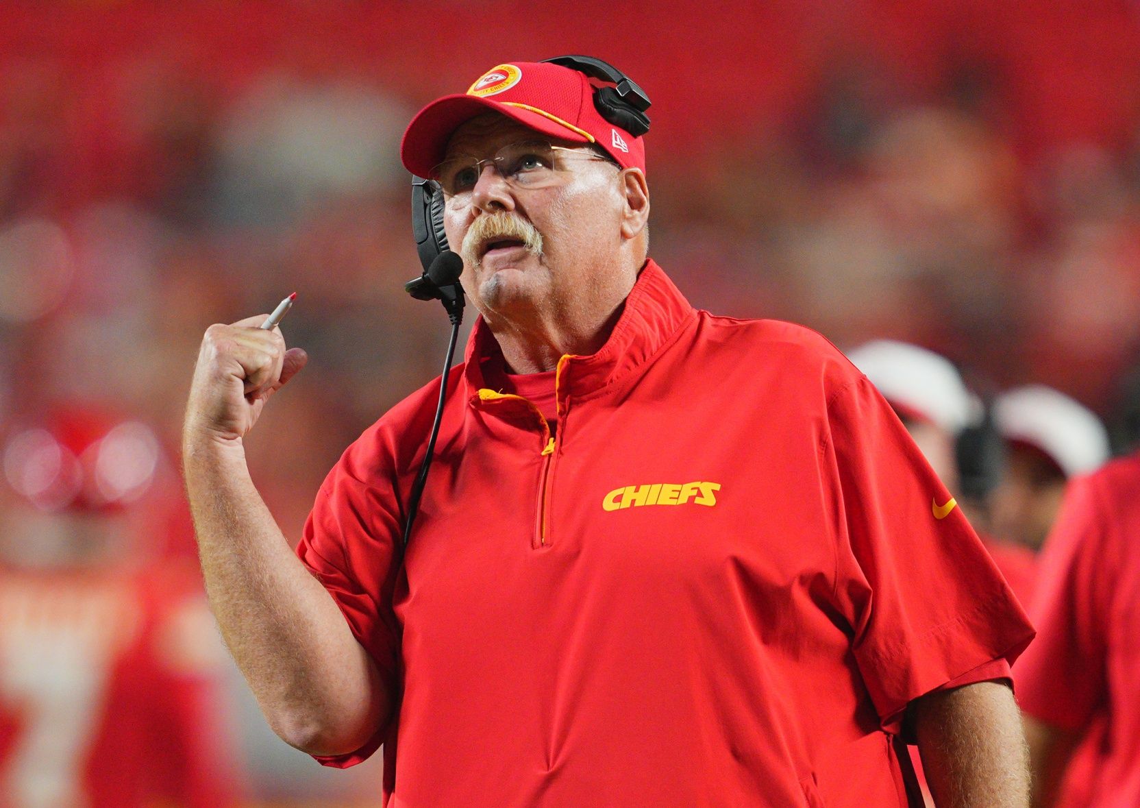 Kansas City Chiefs head coach Andy Reid reacts to a touchdown during the second half against the Chicago Bears at GEHA Field at Arrowhead Stadium.