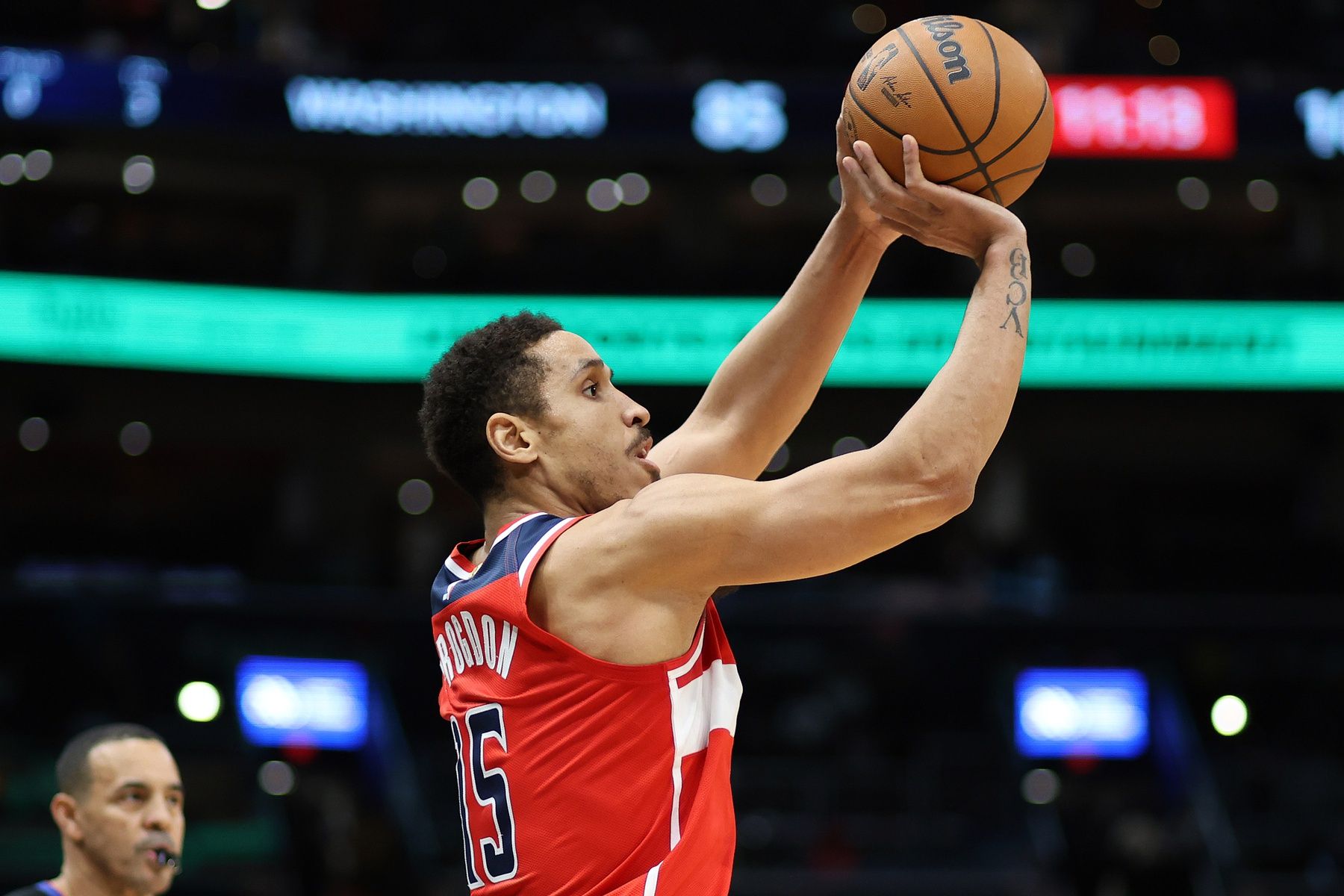 Washington Wizards guard Malcolm Brogdon (15) takes a shot during the second half at Capital One Arena.