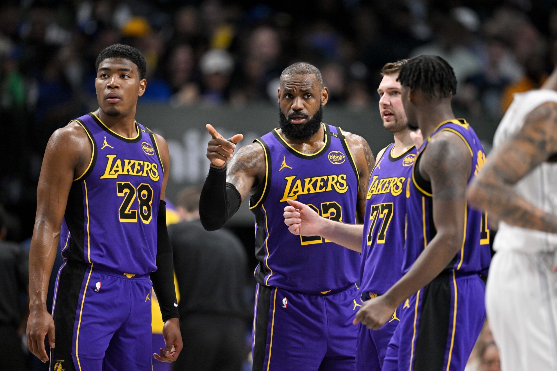 Los Angeles Lakers forward Rui Hachimura (28) and forward LeBron James (23) and guard Luka Doncic (77) and forward Dorian Finney-Smith (17) during the game between the Dallas Mavericks and the Los Angeles Lakers at American Airlines Center.