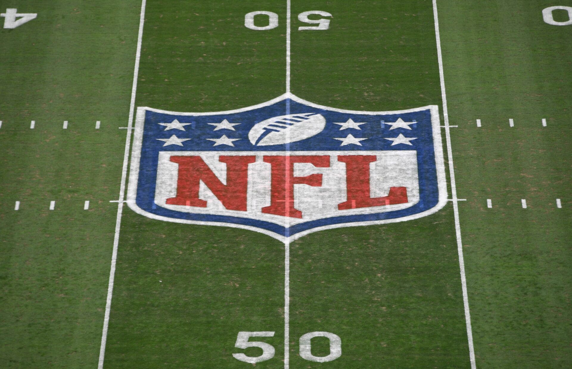 General overall view of the NFL Shield logo at midfield during the NFC Wild Card playoff football game between the Atlanta Falcons and the Los Angeles Rams at Los Angeles Memorial Coliseum.