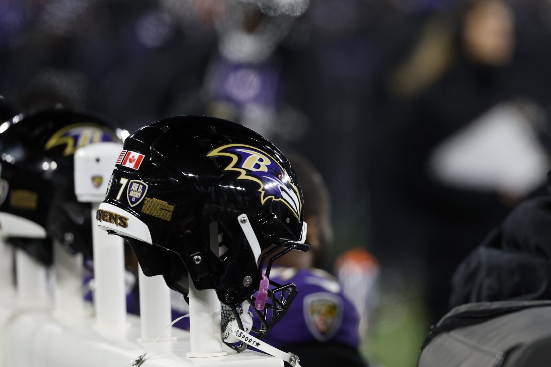 A view of Baltimore Ravens players' helmets on a heated bench against the Pittsburgh Steelers in an AFC wild card game at M&T Bank Stadium.