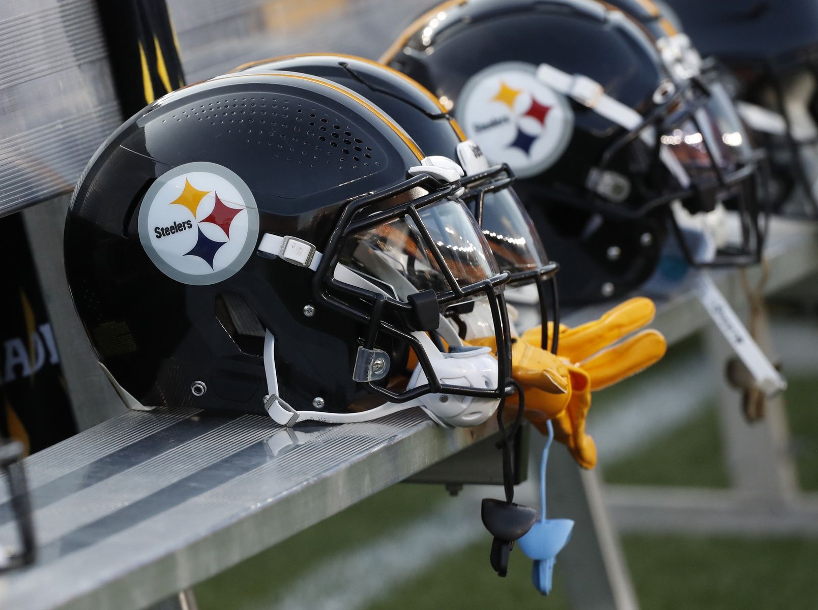 Pittsburgh Steelers helmets on the bench during the game against the Houston Texans during the first quarter at Acrisure Stadium.