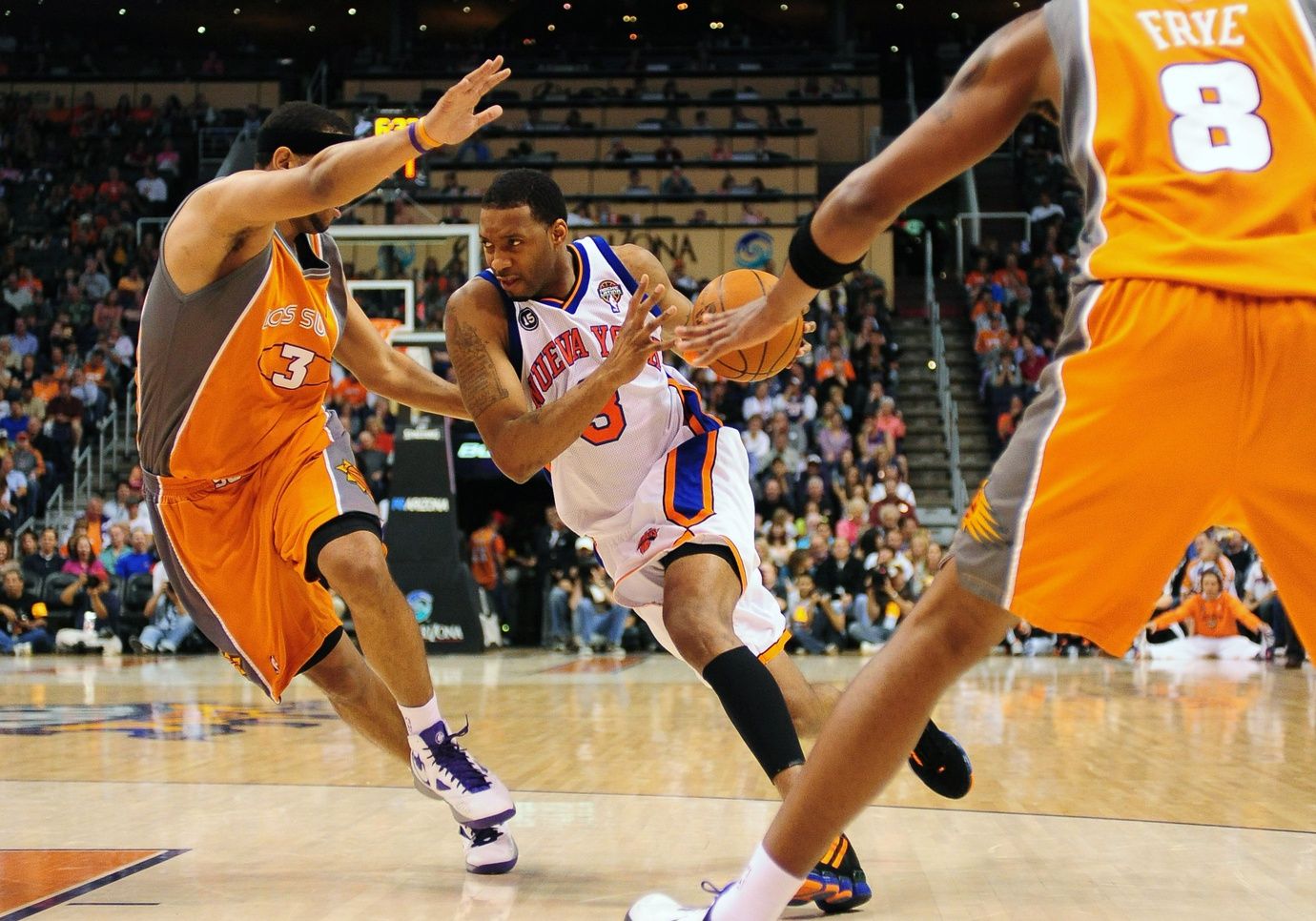 Mar. 26 2010; Phoenix, AZ, USA; New York Knicks guard Tracy McGrady (3) drives the ball against Phoenix Suns forward Jared Dudley (3) in the first half at the US Airways Center.