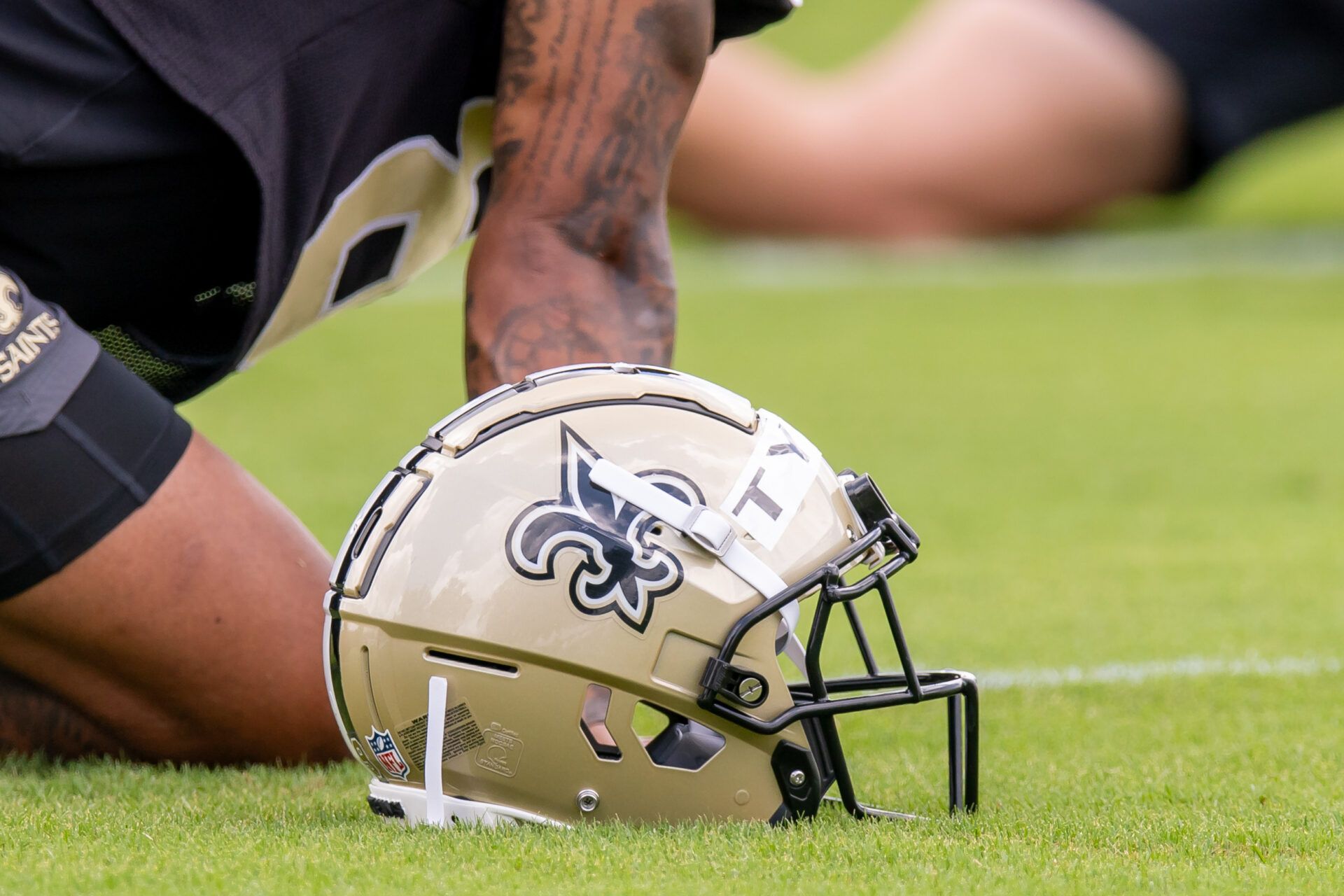 Detailed view of the Saints helmet during minicamp at Ochsner Sports Performance Center.