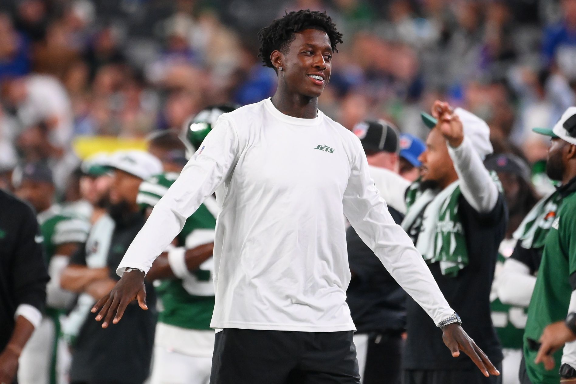 New York Jets cornerback Sauce Gardner (1) reacts to a play against the New York Giants during the second half at MetLife Stadium.
