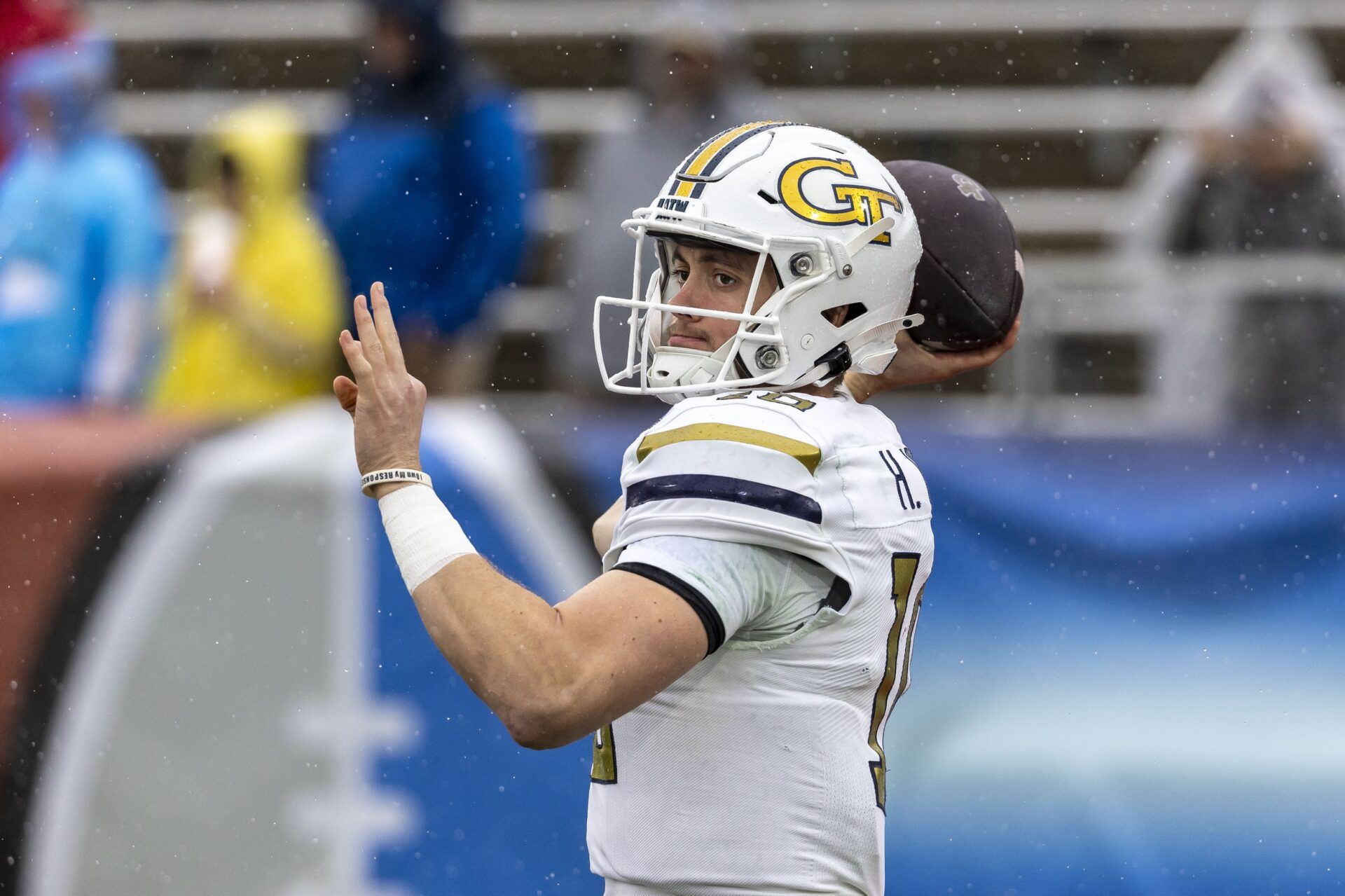 Georgia Tech Yellow Jackets quarterback Haynes King (10) warms up before the 2024 Birmingham Bowl at Protective Stadium.