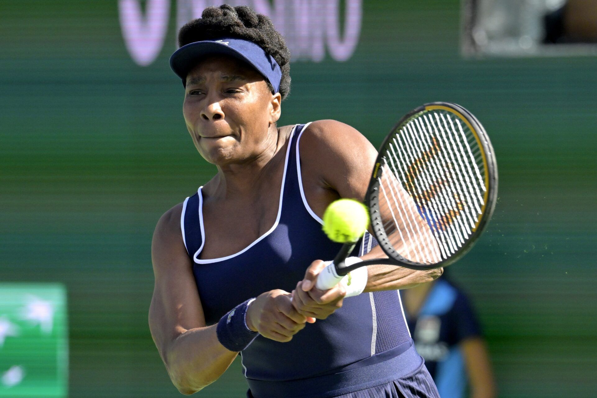 Venus Williams (USA) hits a shot during her first round match against Nao Hibino (JPN) in the BNP Paribas Open at the Indian Wells Tennis Garden.