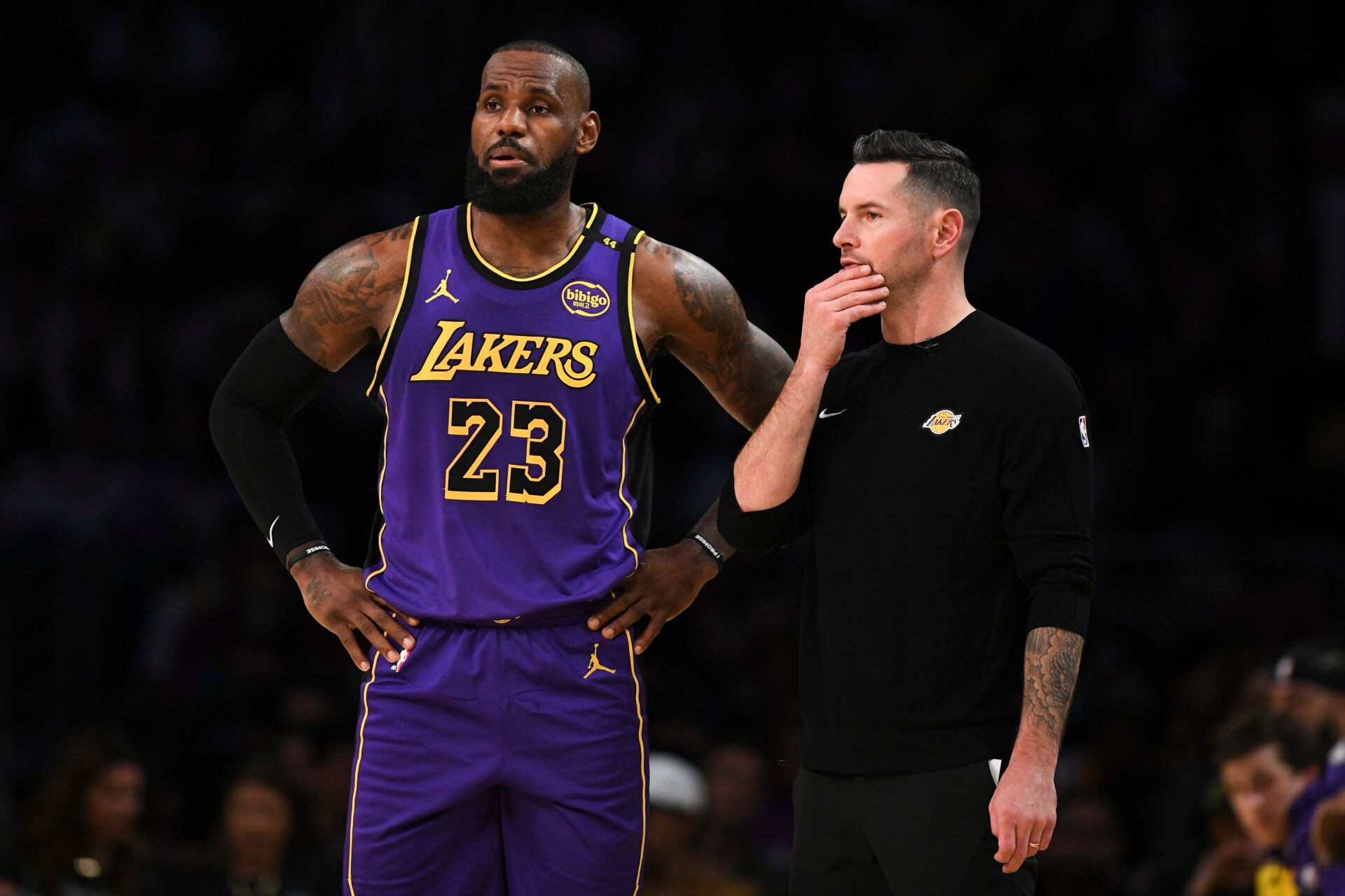 Los Angeles Lakers forward LeBron James (23) with Los Angeles Lakers head coach JJ Redick against the Phoenix Suns during the first half at Crypto.com Arena.