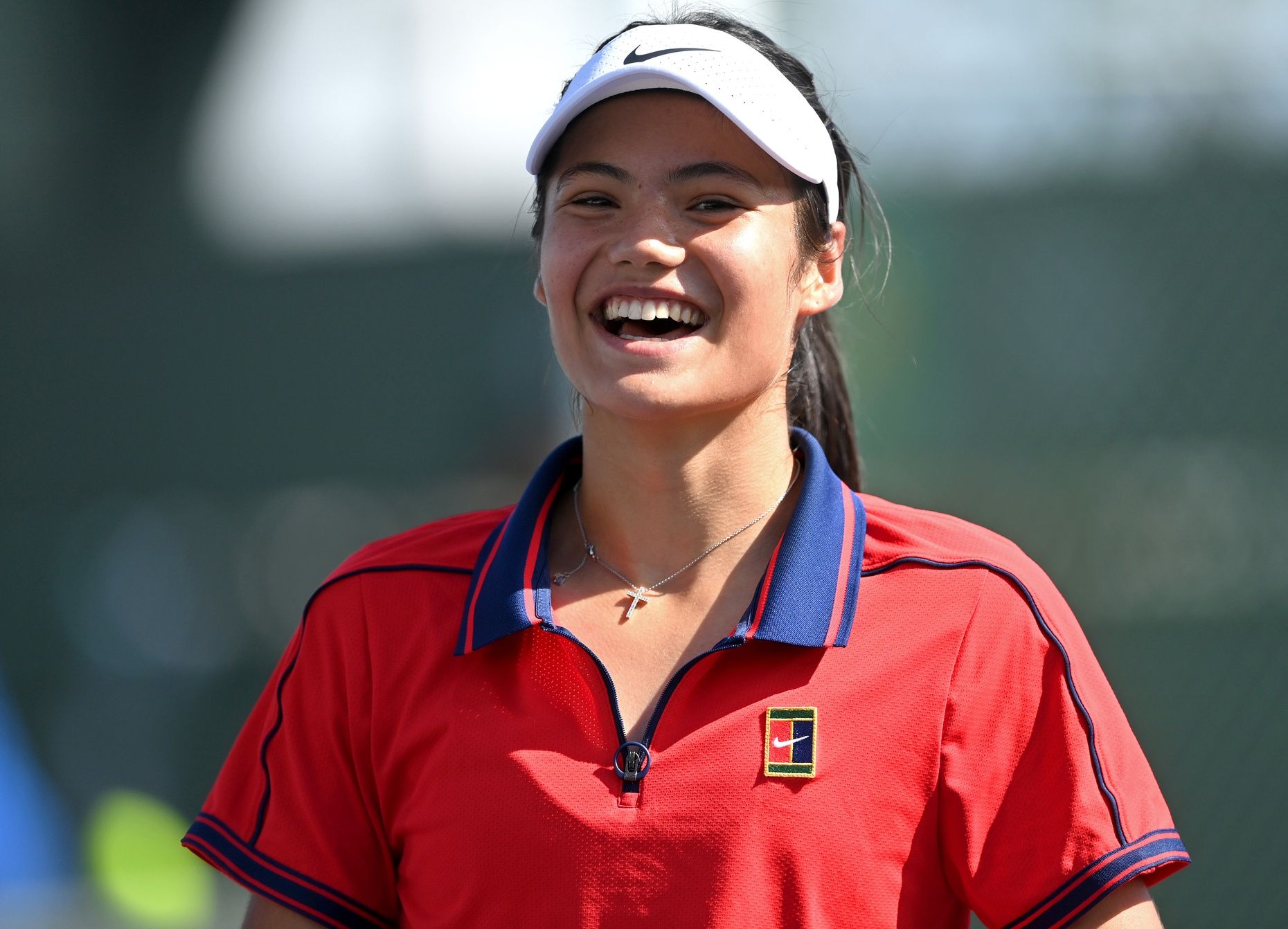Emma Raducanu (GBR) reacts on the practice courts during day 2 of the BNP Paribas Open at the Indian Wells Tennis Garden.