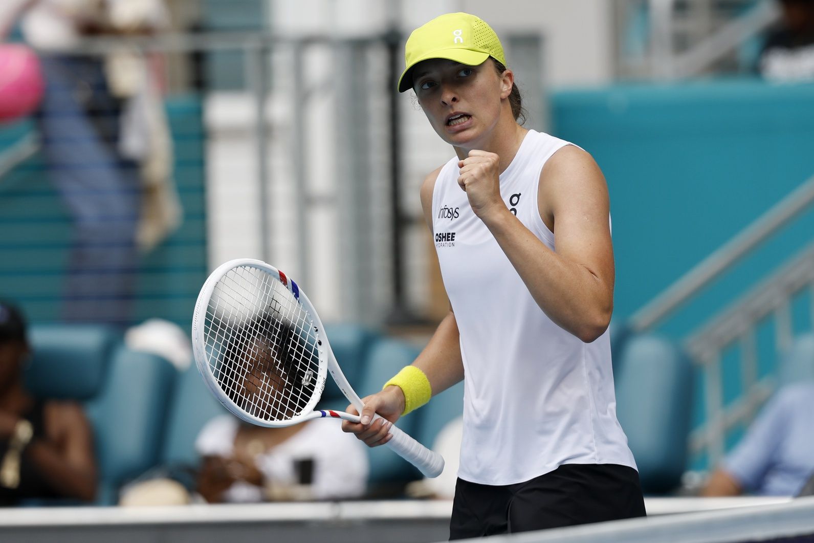 Iga Swiatek (POL) celebrates after match point against Elise Mertens (BEL)(not pictured) on day six of the Miami Open at Hard Rock Stadium.