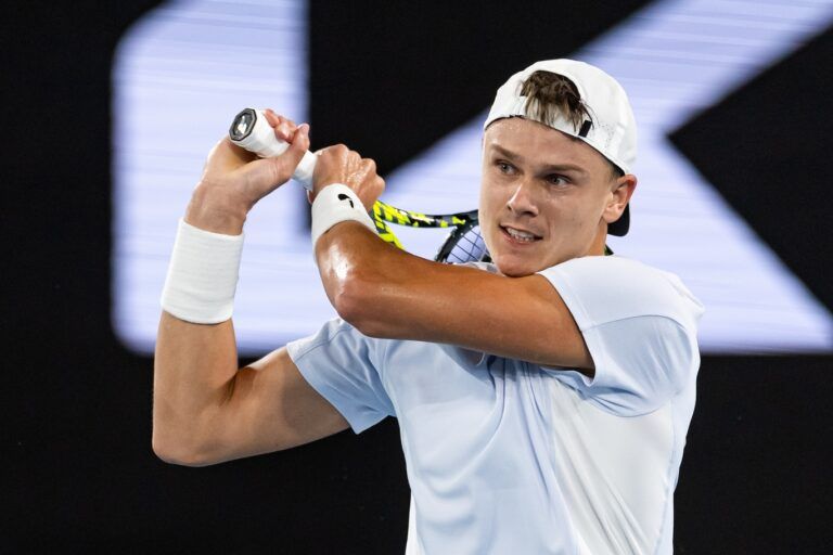 Holger Rune of Denmark in action during his match against Miomir Kecmanovic of Serbia in the third round of the men's singles at the 2025 Australian Open at Melbourne Park.