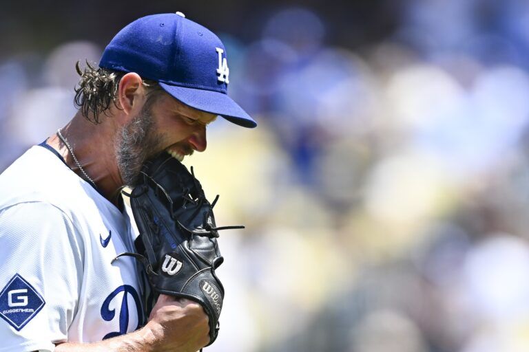 Los Angeles Dodgers starting pitcher Clayton Kershaw (22) reacts after being relieved from the game against the Milwaukee Brewers during the fifth inning at Dodger Stadium.