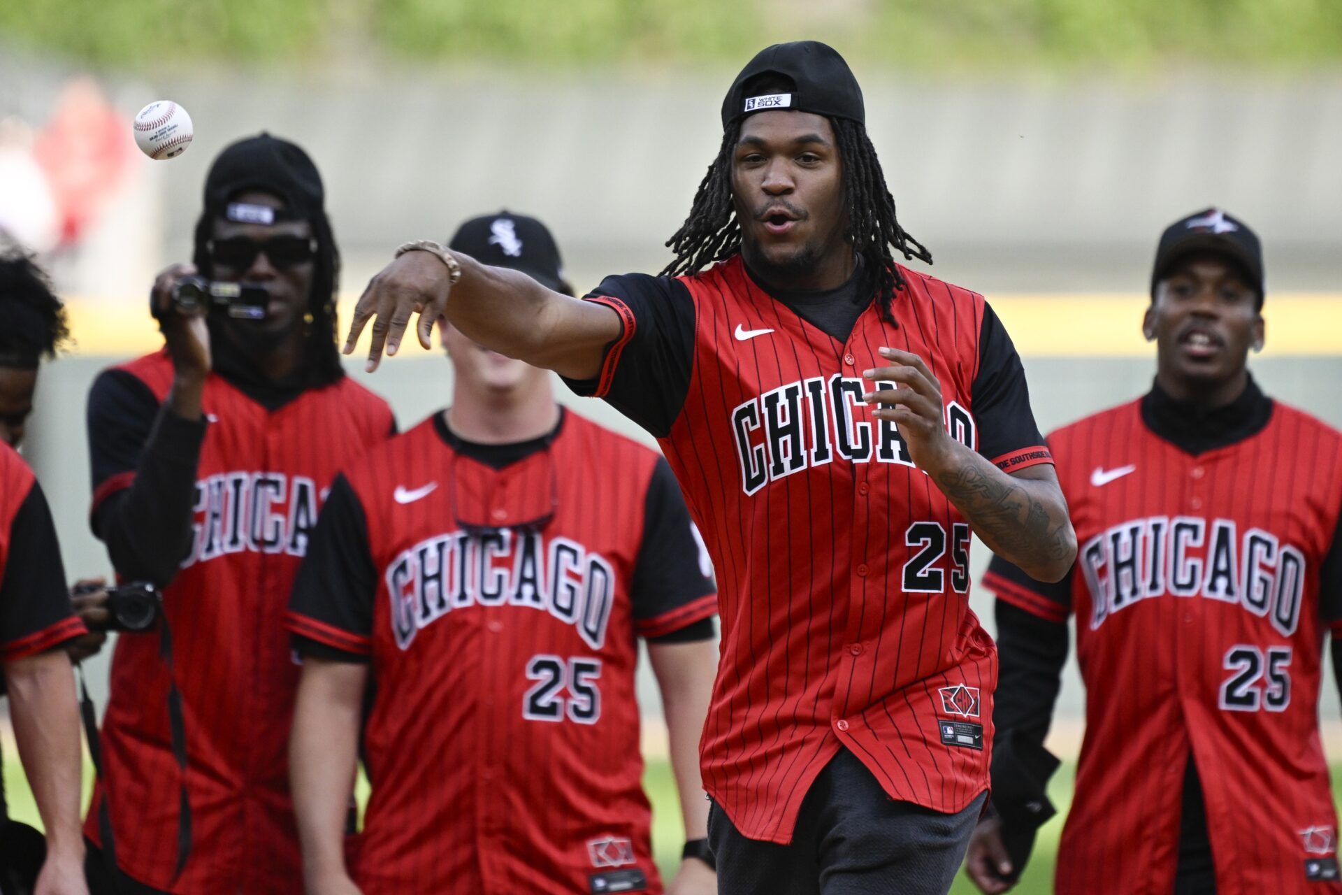 Chicago Bears rookie Luther Burden III throws out a ceremonial first pitch before the game between the Chicago White Sox and he St. Louis Cardinals at Rate Field.