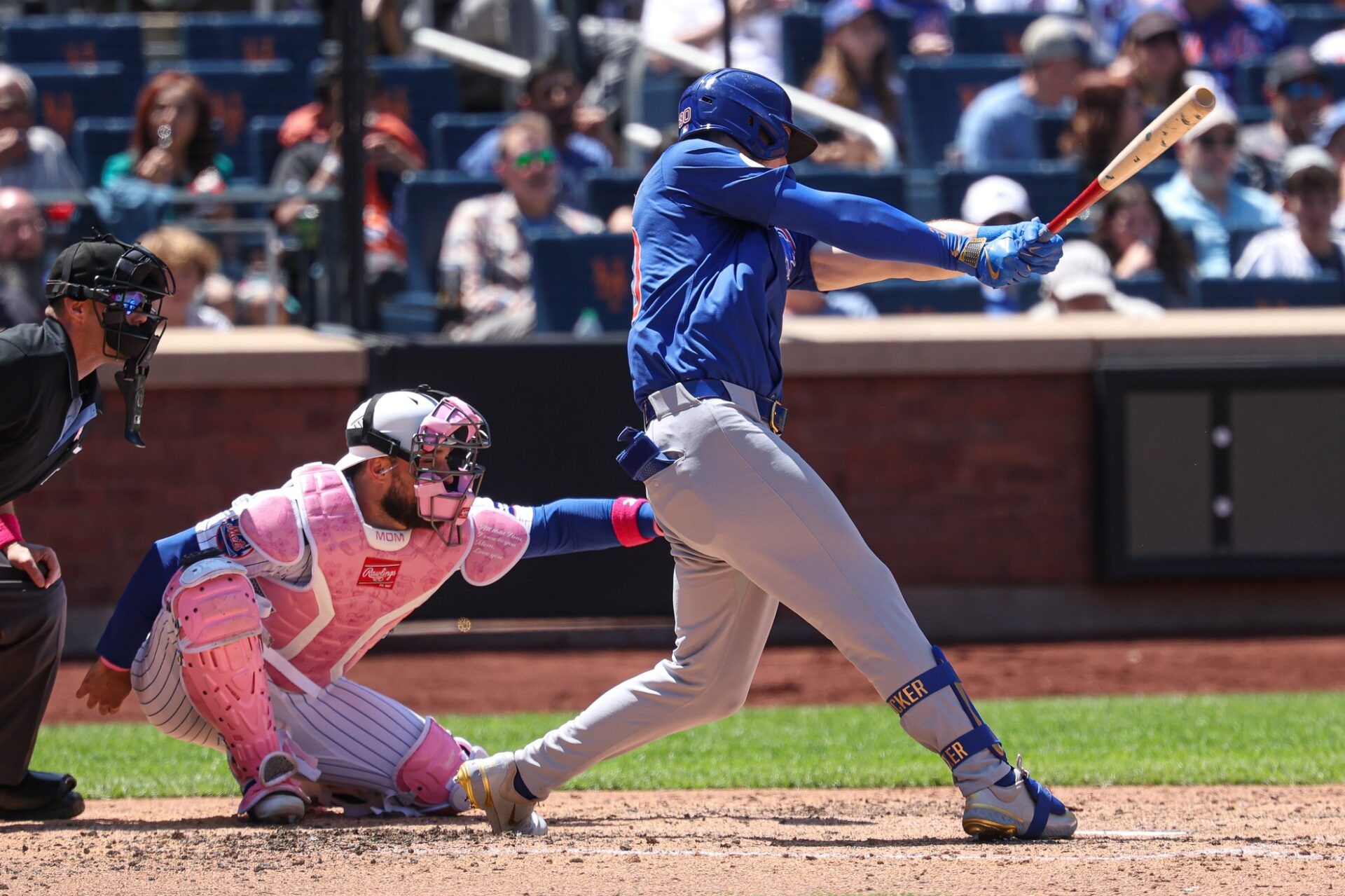 New York Mets catcher Luis Torrens (13) is hit by a foul ball by Chicago Cubs right fielder Kyle Tucker (30) during the sixth inning at Citi Field. Torrens would leave the game due to an injury after the play.