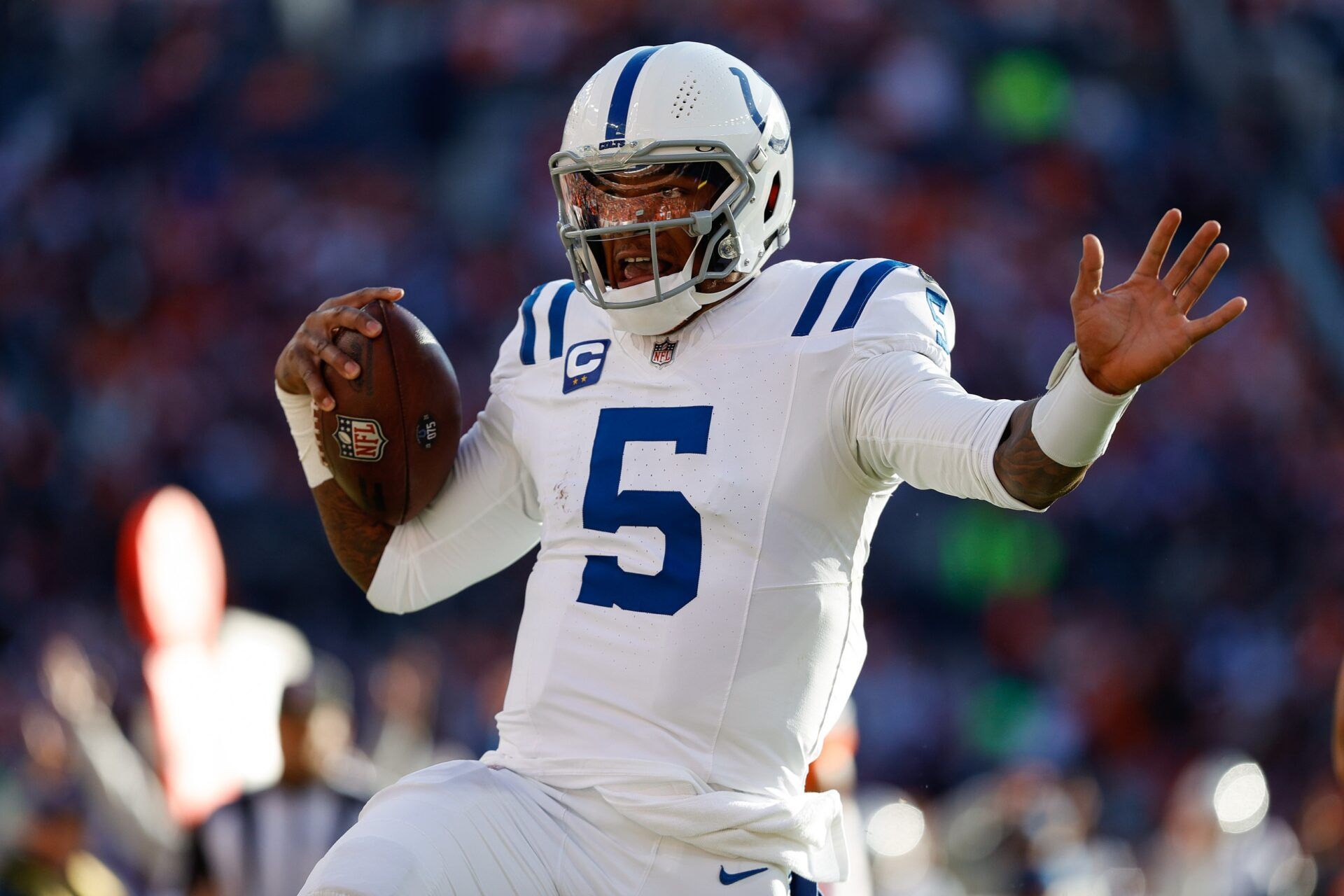 Indianapolis Colts quarterback Anthony Richardson (5) runs for a touchdown in the first quarter against the Denver Broncos at Empower Field at Mile High.