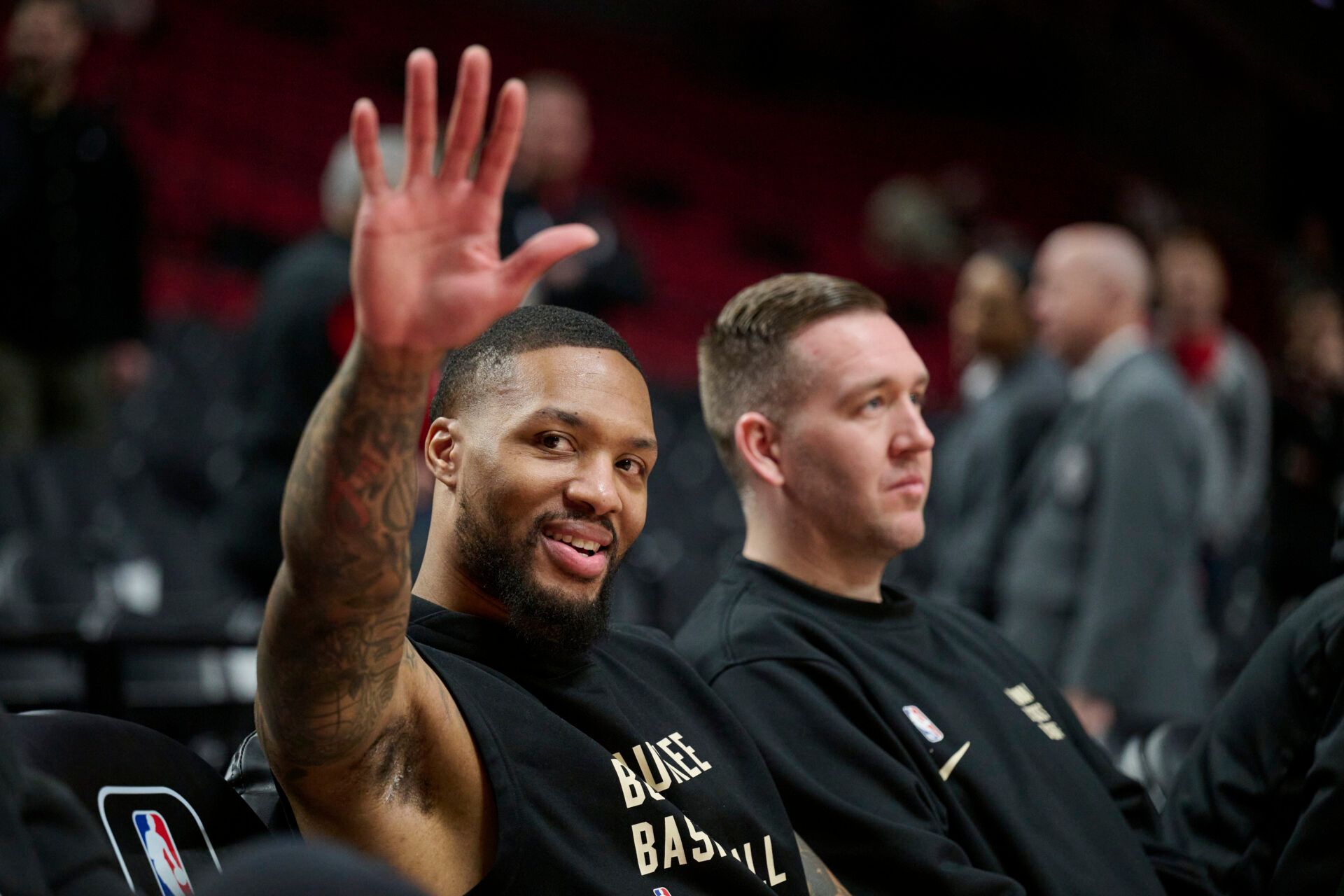 Milwaukee Bucks guard Damian Lillard (0) waves to fans before a game against the Portland Trail Blazers at Moda Center.