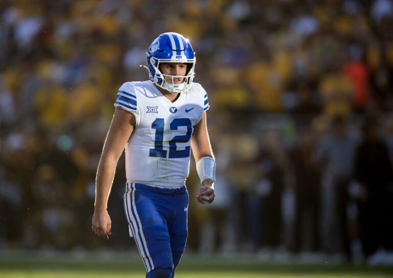 Brigham Young Cougars quarterback Jake Retzlaff (12) against the Arizona State Sun Devils at Mountain America Stadium.