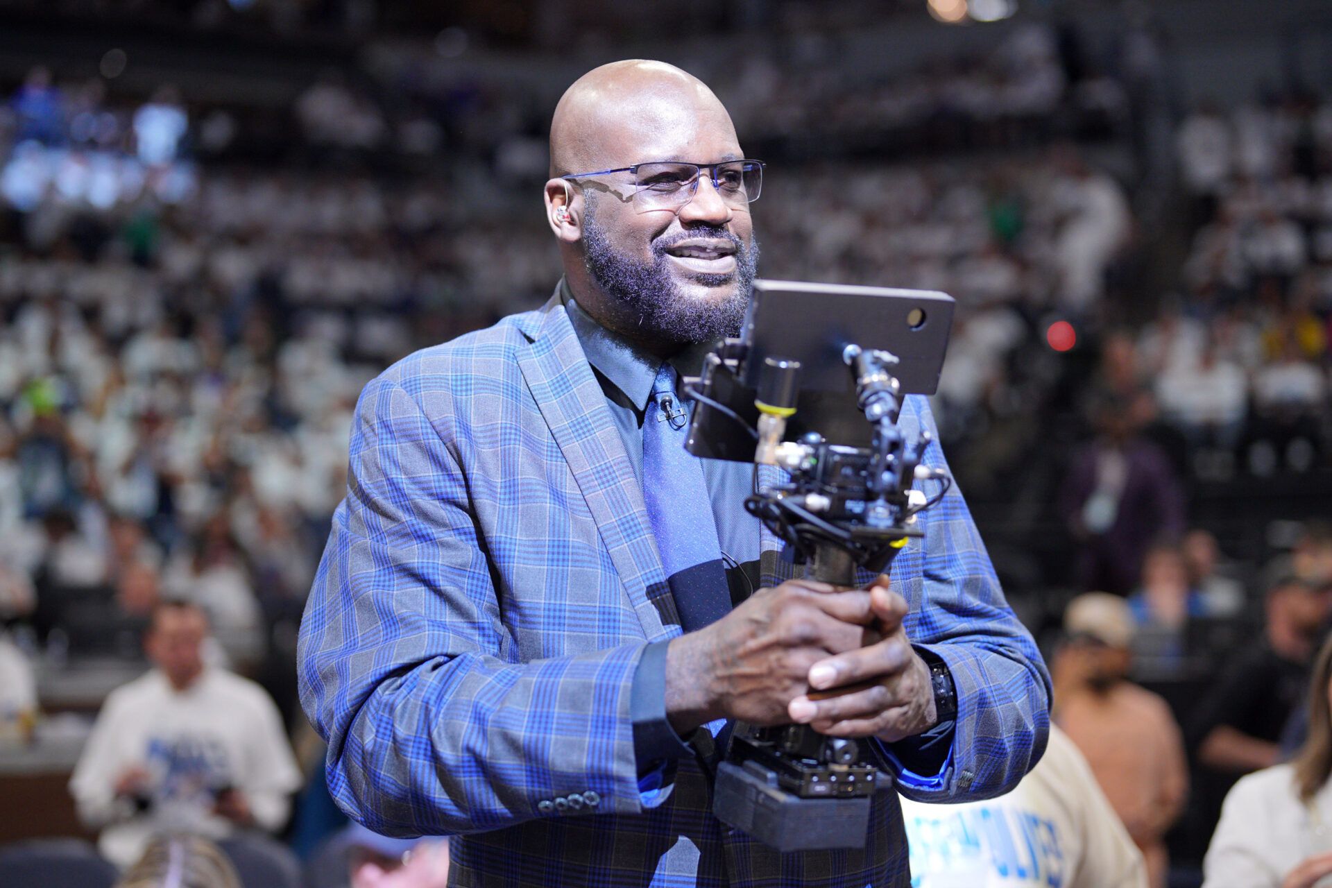 Shaquille O'Neal looks on during halftime between the Minnesota Timberwolves and the Dallas Mavericks during game two of the western conference finals for the 2024 NBA playoffs at Target Center.