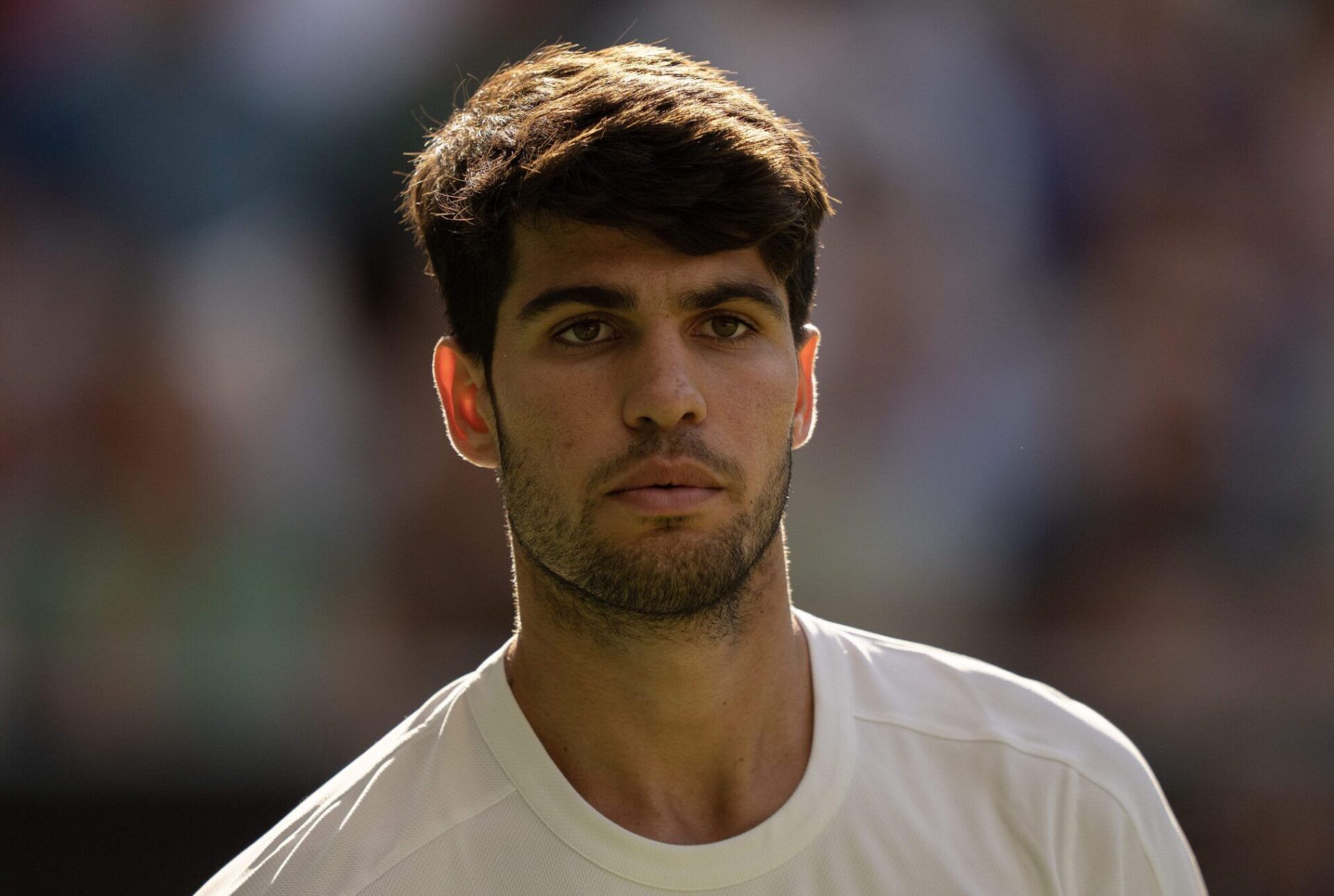 Carlos Alcaraz of Spain during his match against Cameron Norrie of Great Britain on day nine at All England Lawn Tennis and Croquet Club.