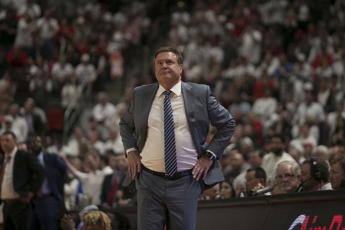 Kanas Jayhawks head coach Bill Self checks the scoreboard during the game against the Texas Tech Red Raiders at United Supermarkets Arena.