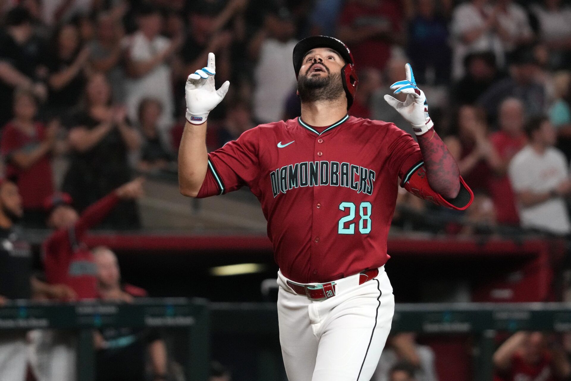 Arizona Diamondbacks third base Eugenio Suarez (28) celebrates after hitting a home run against the Houston Astros in the third inning at Chase Field.