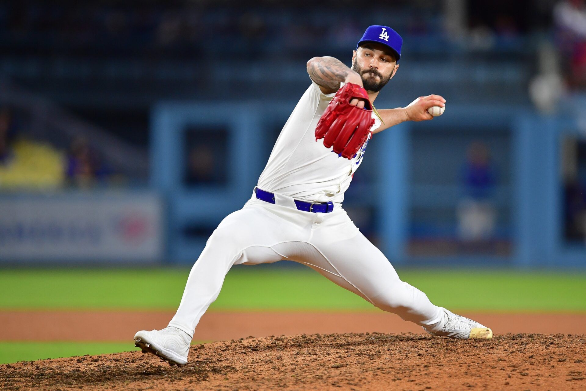 Los Angeles Dodgers pitcher Tanner Scott (66) throws against the Minnesota Twins during the eighth inning at Dodger Stadium.