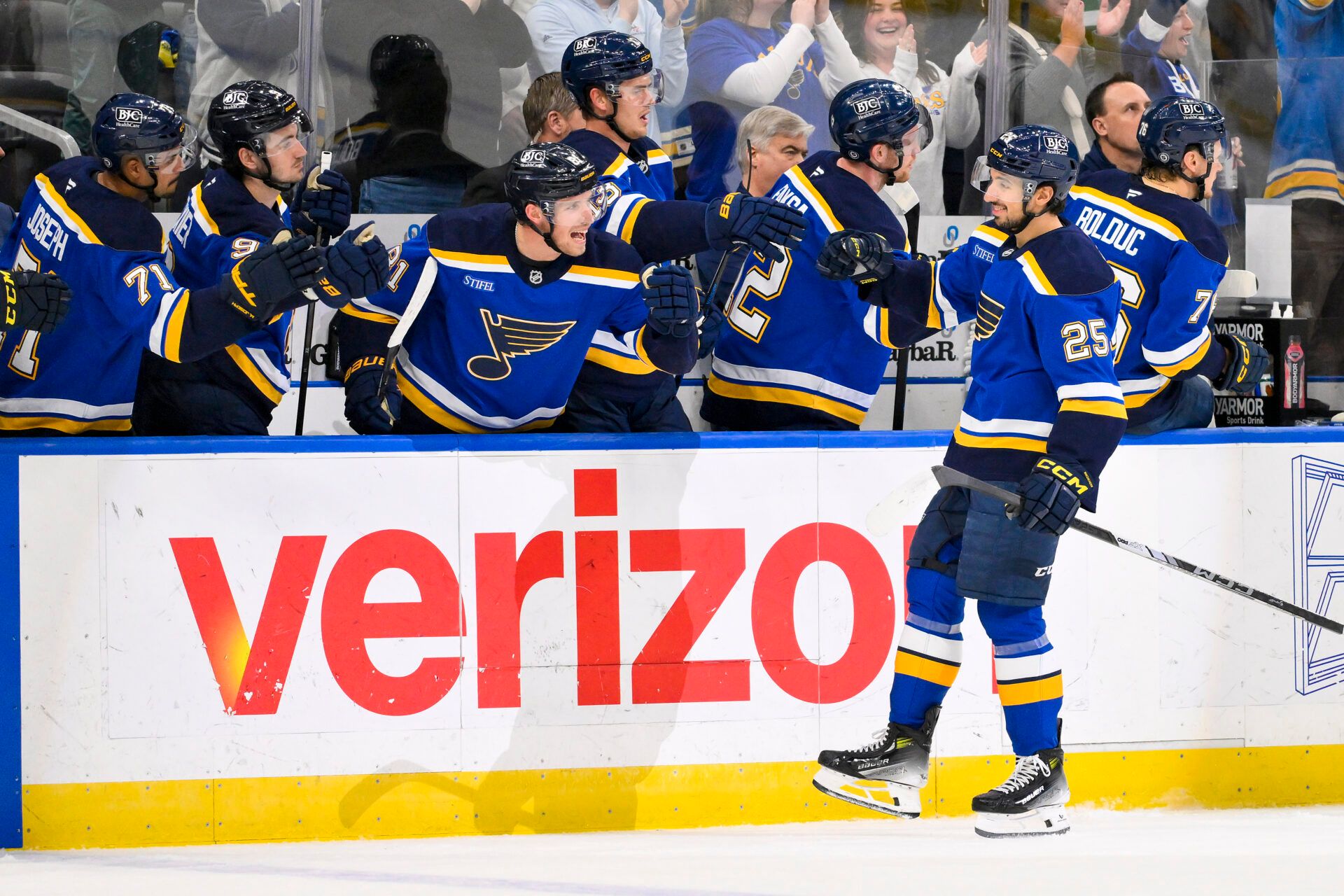 St. Louis Blues center Jordan Kyrou (25) is congratulated by teammates after scoring against the Nashville Predators during the first period at Enterprise Center.