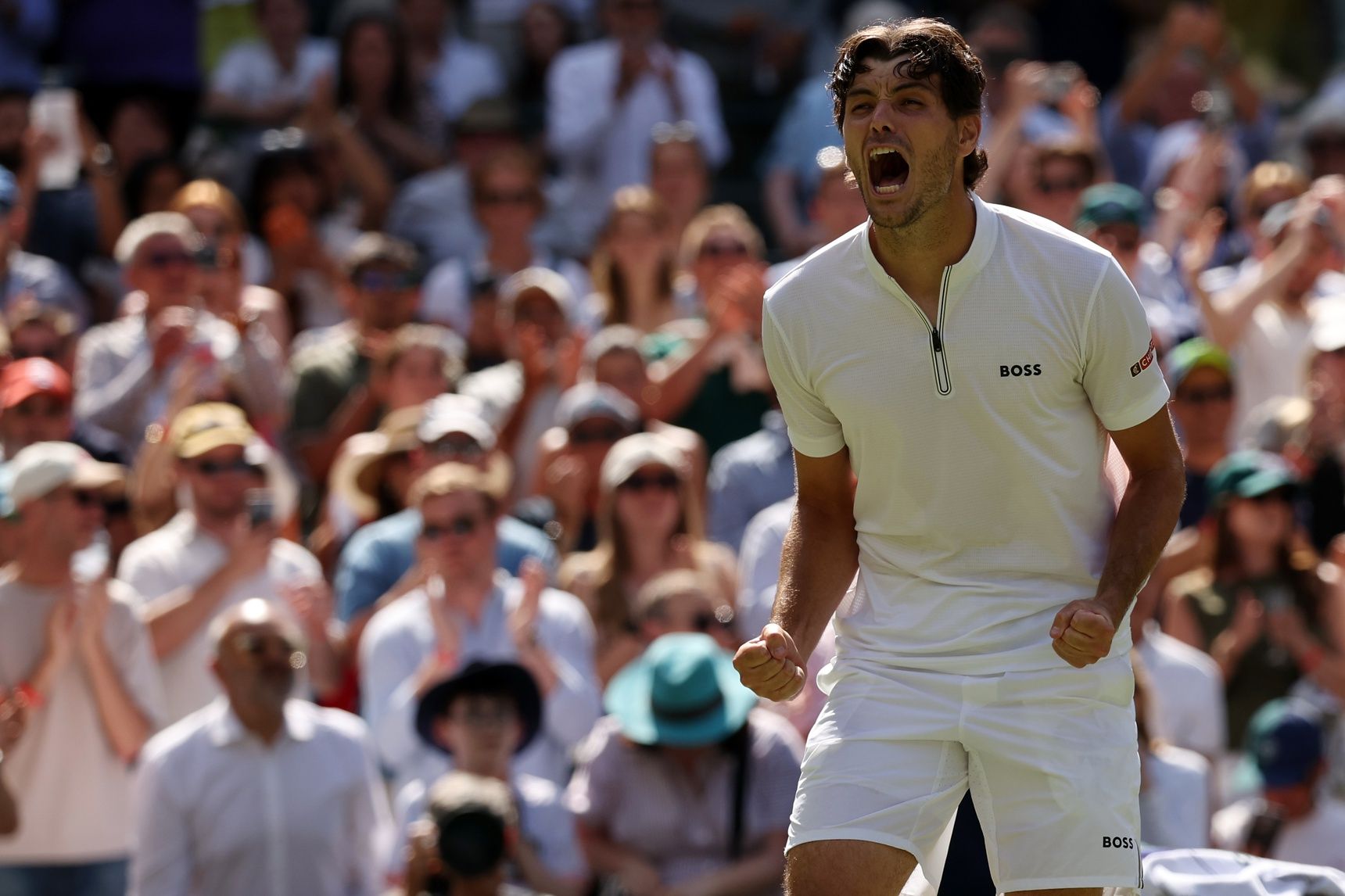 Taylor Fritz (USA) celebrates after his match against Karen Khachanov (not pictured) in a gentlemen's singles quarter-final on day eight of The Championships Wimbledon 2025 at All England Lawn Tennis and Croquet Club.