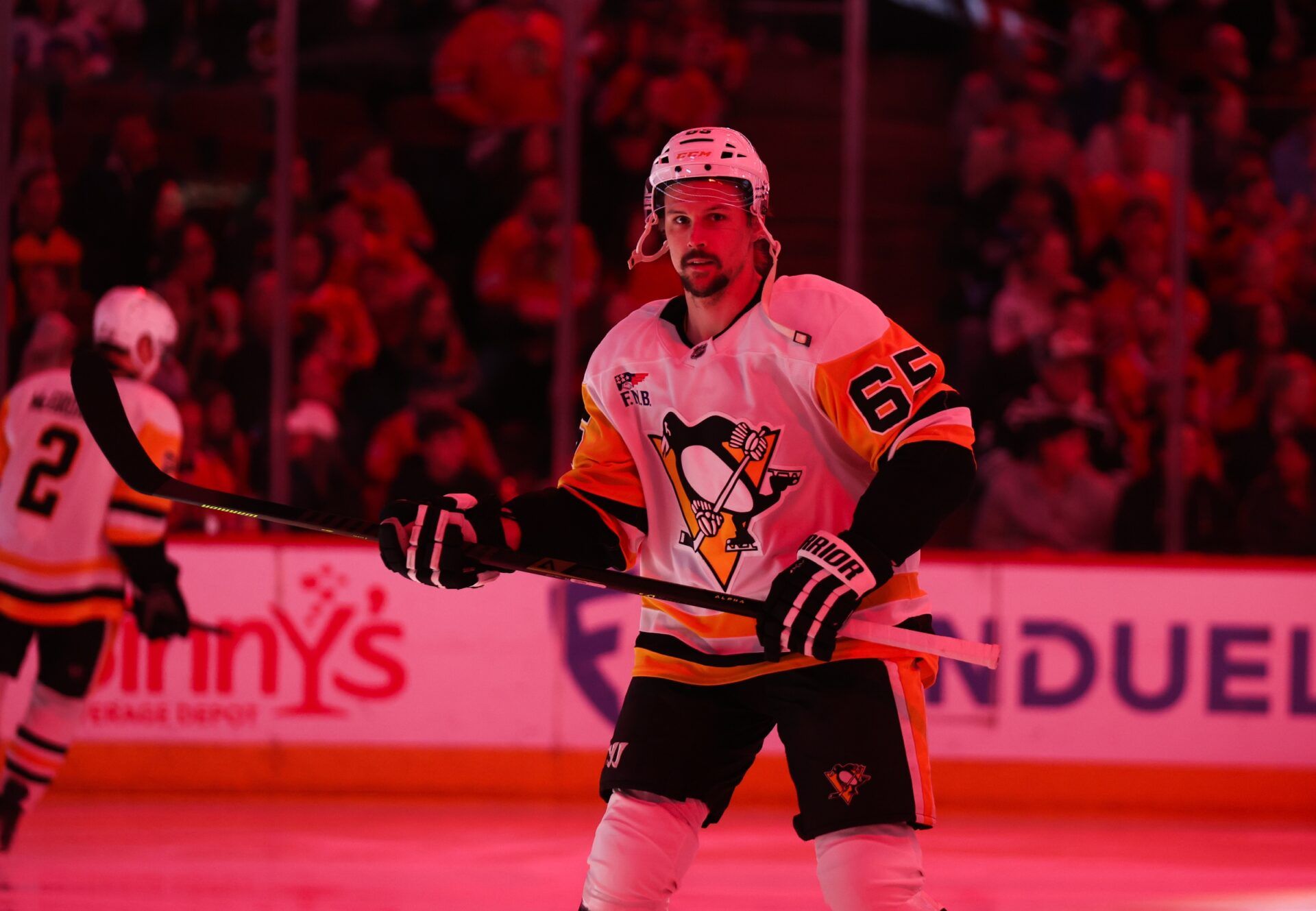 Pittsburgh Penguins defenseman Erik Karlsson (65) warms up before a game against the Chicago Blackhawks at United Center.