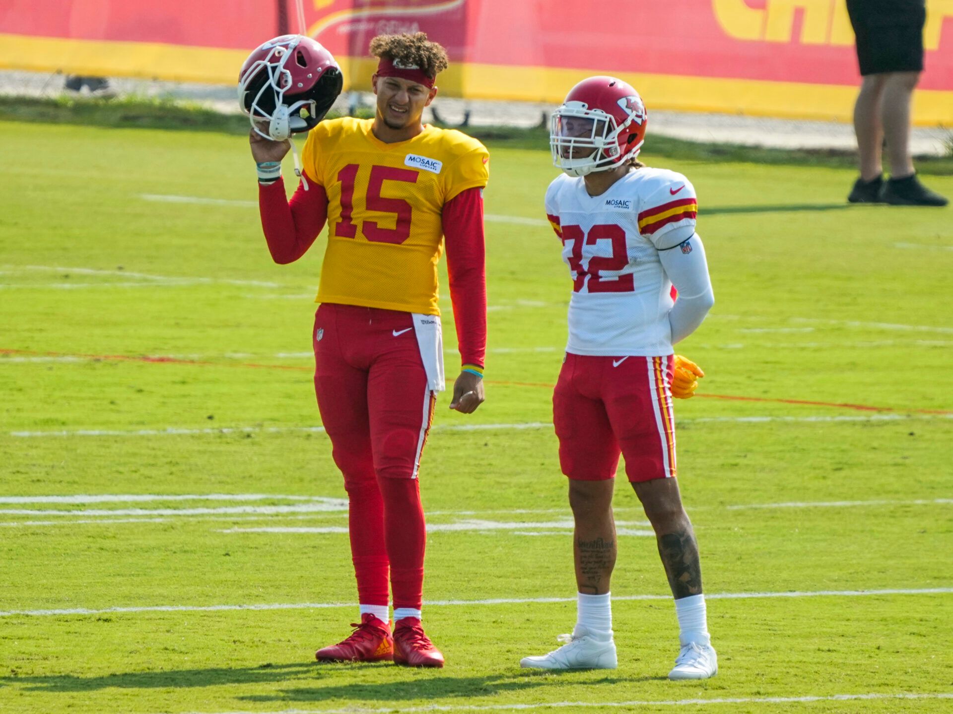 Kansas City Chiefs quarterback Patrick Mahomes (15) talks with free safety Tyrann Mathieu (32) during training camp at Missouri Western State University.