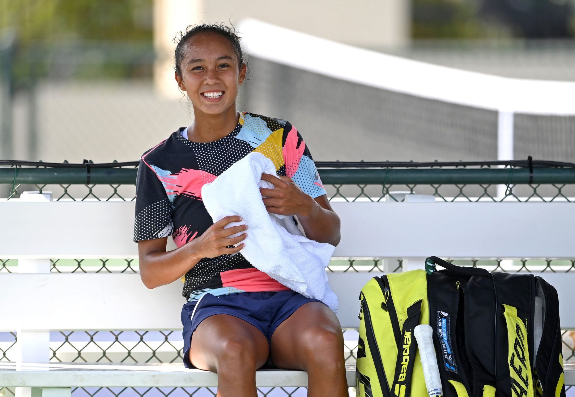 Leylah Fernandez (CAN) takes a break on the practice courts at the Indian Wells Tennis Garden.