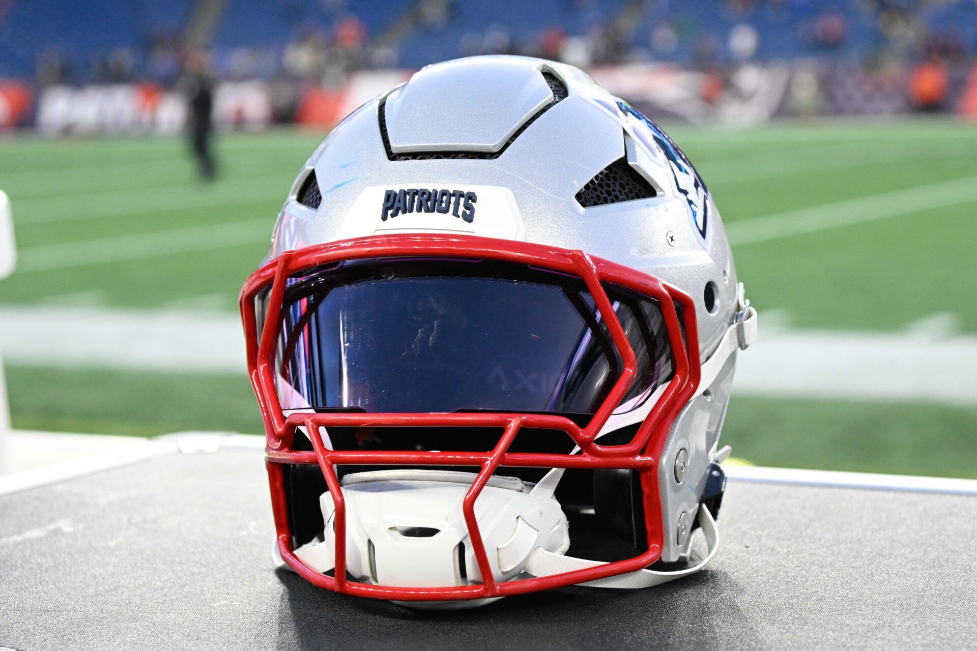 A New England Patriots helmet sit on an equipment case after a game against the Los Angeles Rams at Gillette Stadium.