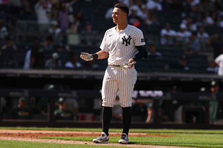 New York Yankees shortstop Anthony Volpe (11) reacts after being ejected for arguing after striking out during the eighth inning against the Athletics at Yankee Stadium.