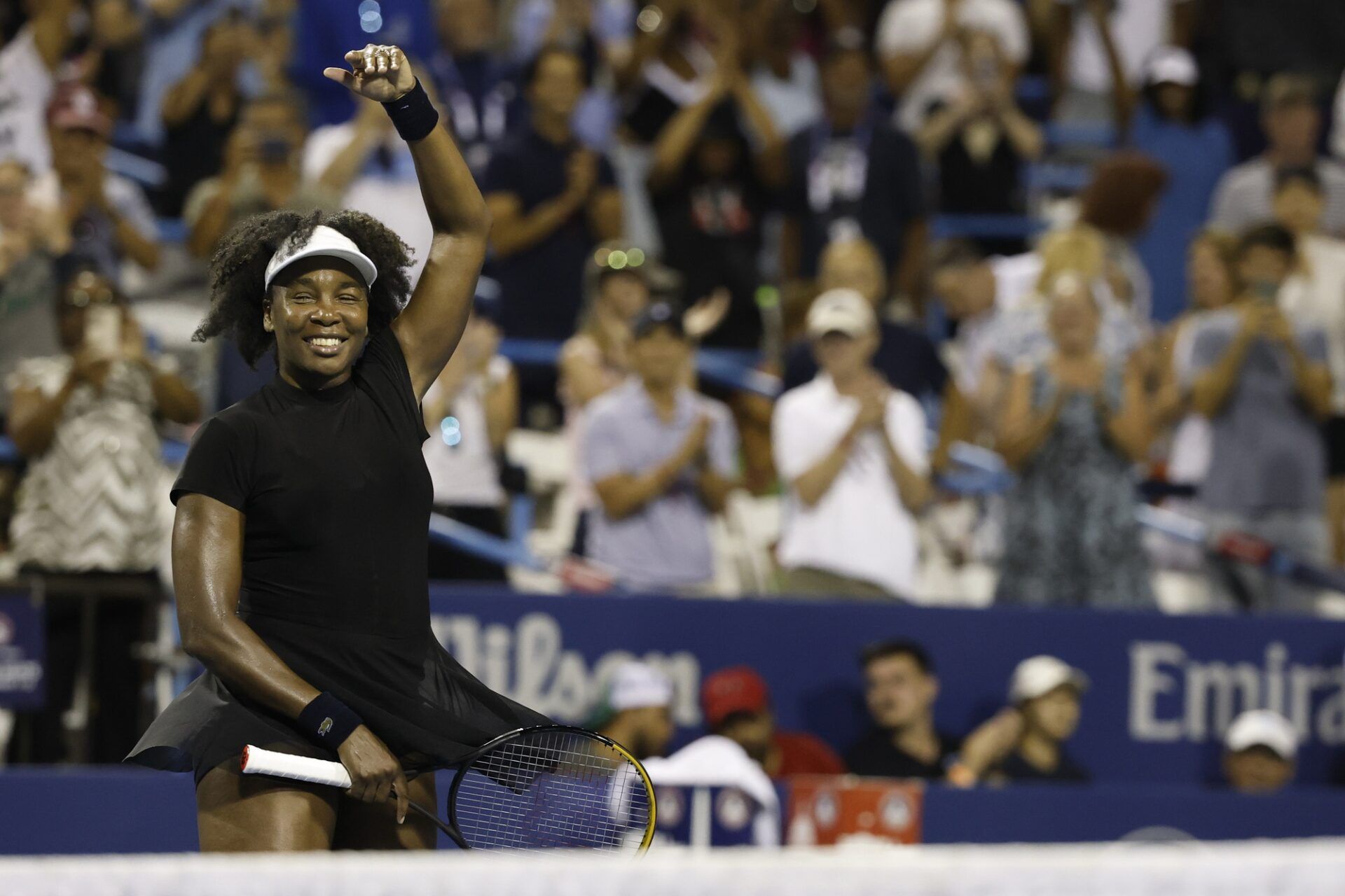 Venus Williams (USA) waves to the crowd after her match against Peyton Stearns (USA)(not pictured) in a women's singles match on day two of the Mubadala Citi DC Open at Rock Creek Park Tennis Center.