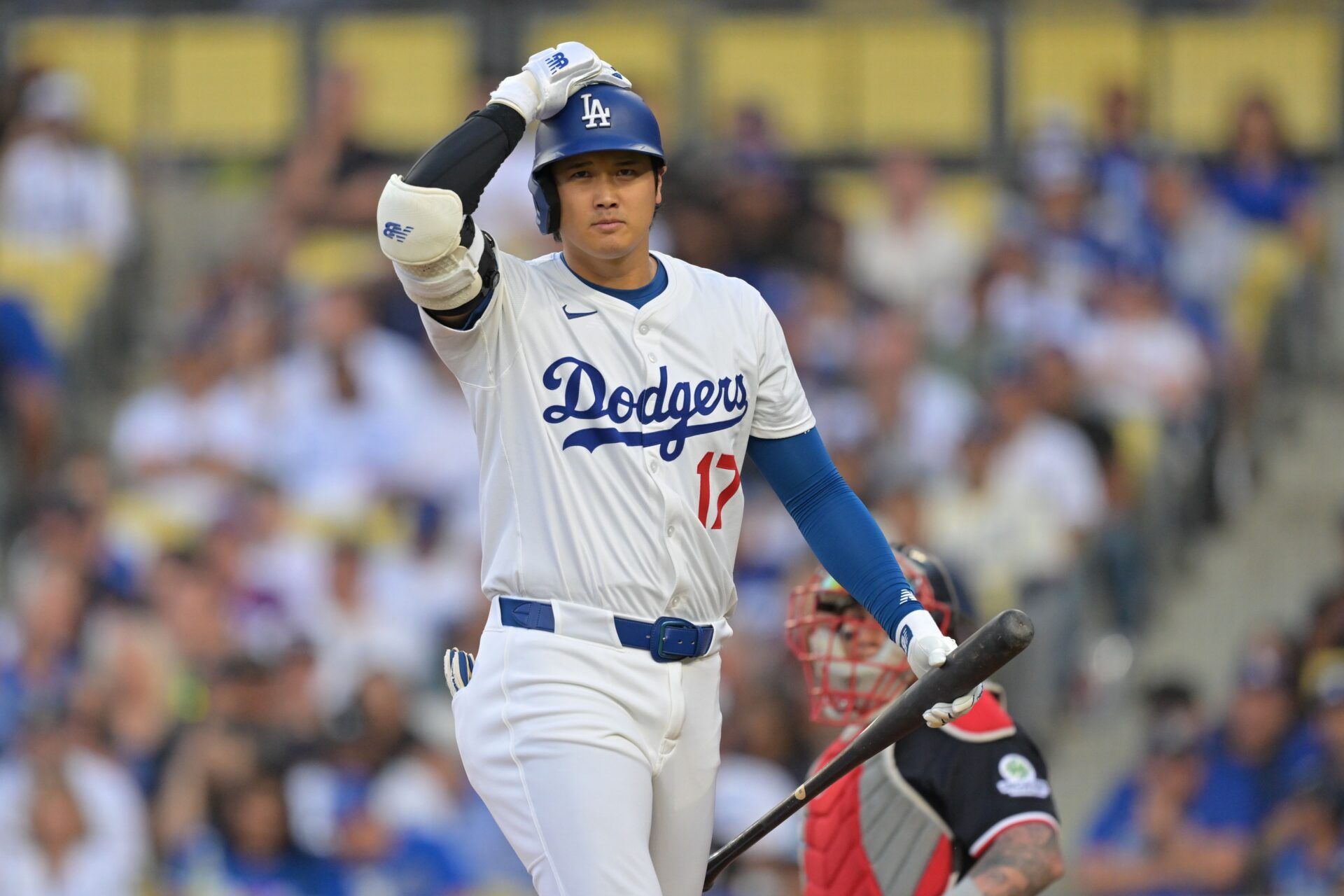 Los Angeles Dodgers two-way player Shohei Ohtani (17) reacts against the Minnesota Twins in the first inning at Dodger Stadium.