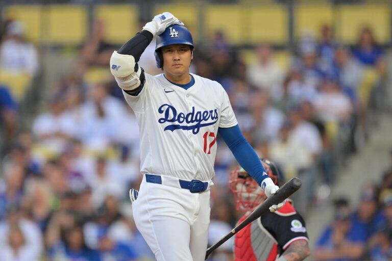 Los Angeles Dodgers two-way player Shohei Ohtani (17) reacts against the Minnesota Twins in the first inning at Dodger Stadium.